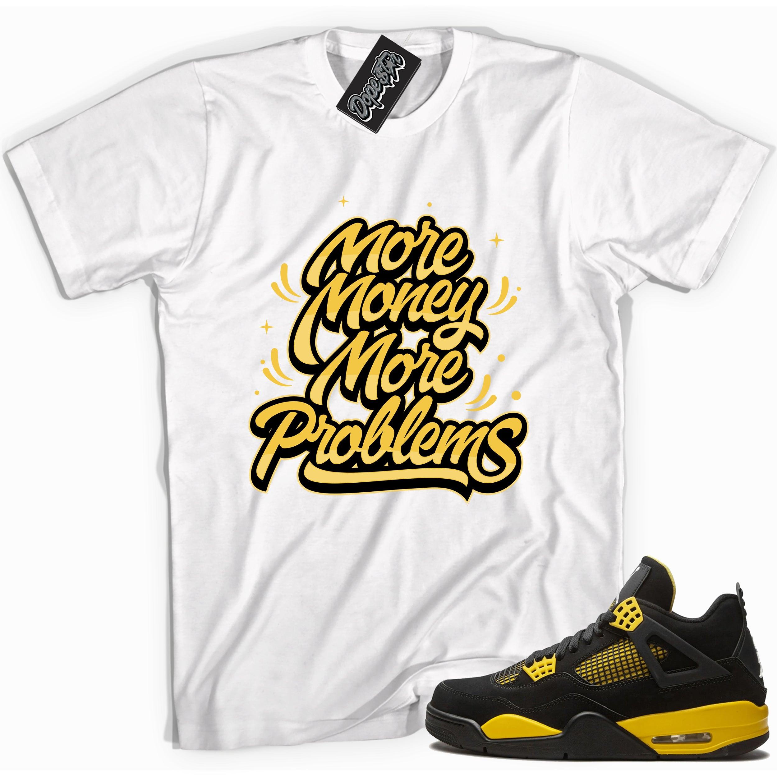 Cool white graphic tee with 'more money more problems' print, that perfectly matches Air Jordan 4 Thunder sneakers