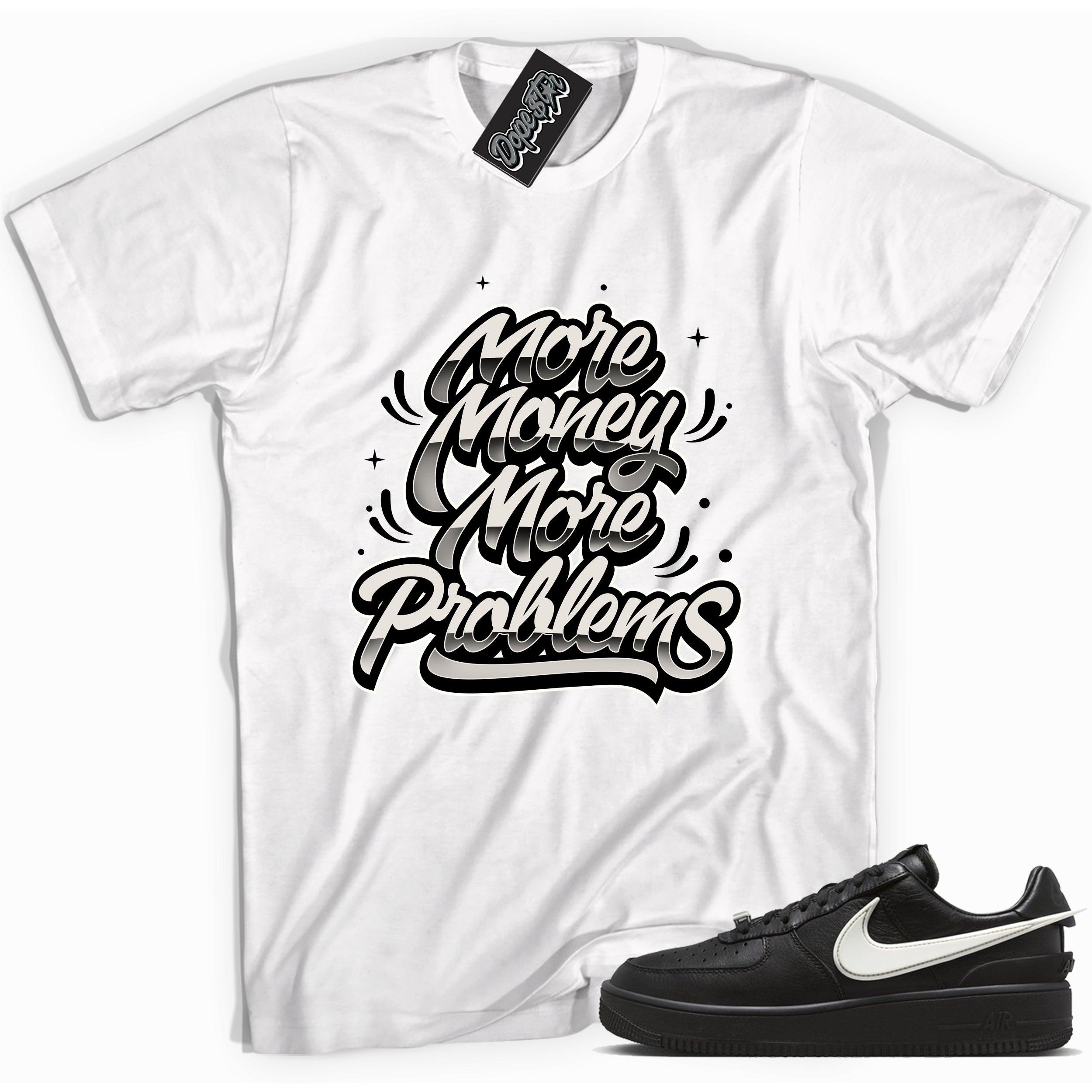 Cool white graphic tee with 'more money more problems' print, that perfectly matches Nike Air Force 1 Low SP Ambush Phantom sneakers.