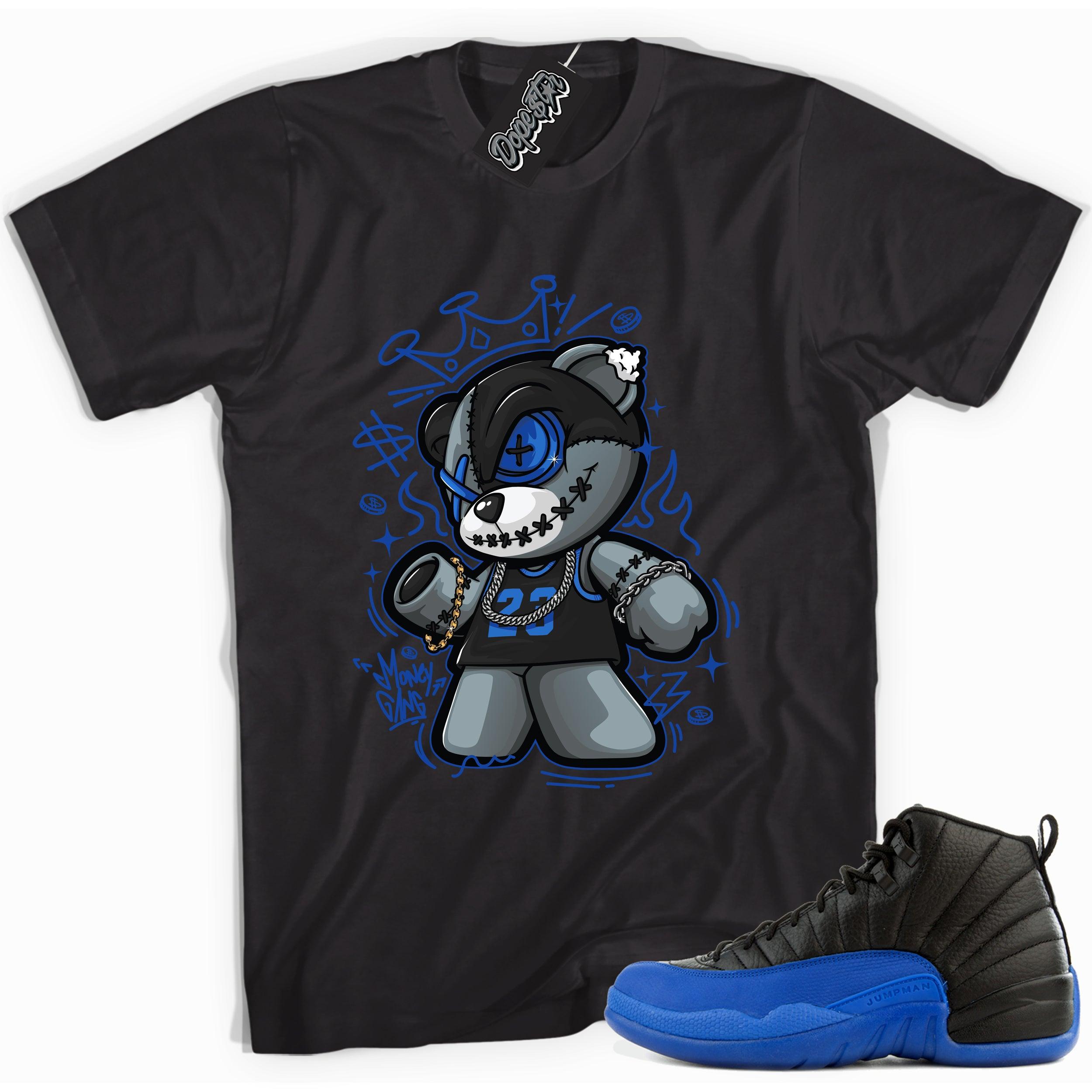 Cool black graphic tee with 'money gang bear' print, that perfectly matches  Air Jordan 12 Retro Black Game Royal sneakers.