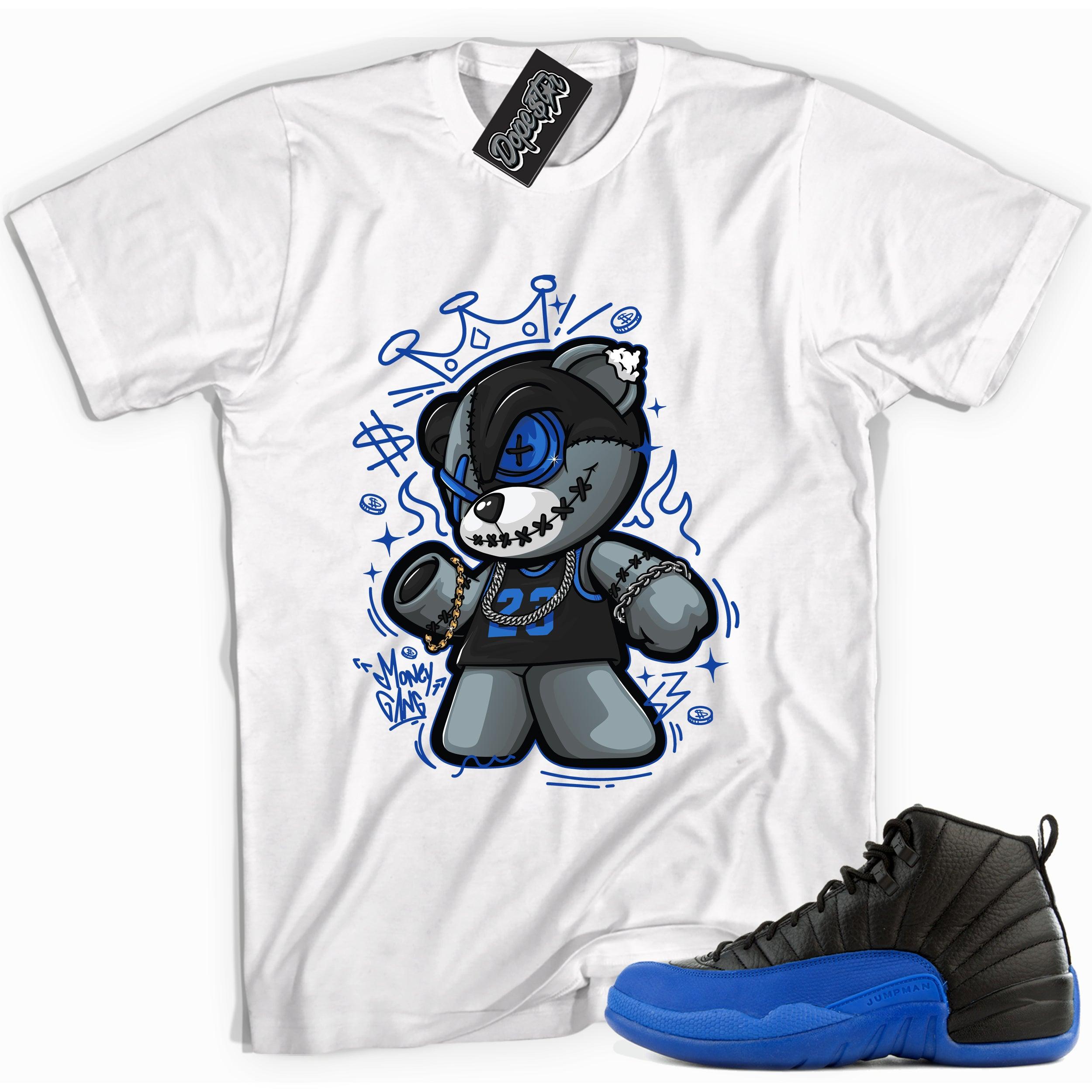 Cool white graphic tee with 'money gang bear' print, that perfectly matches Air Jordan 12 Retro Black Game Royal sneakers.