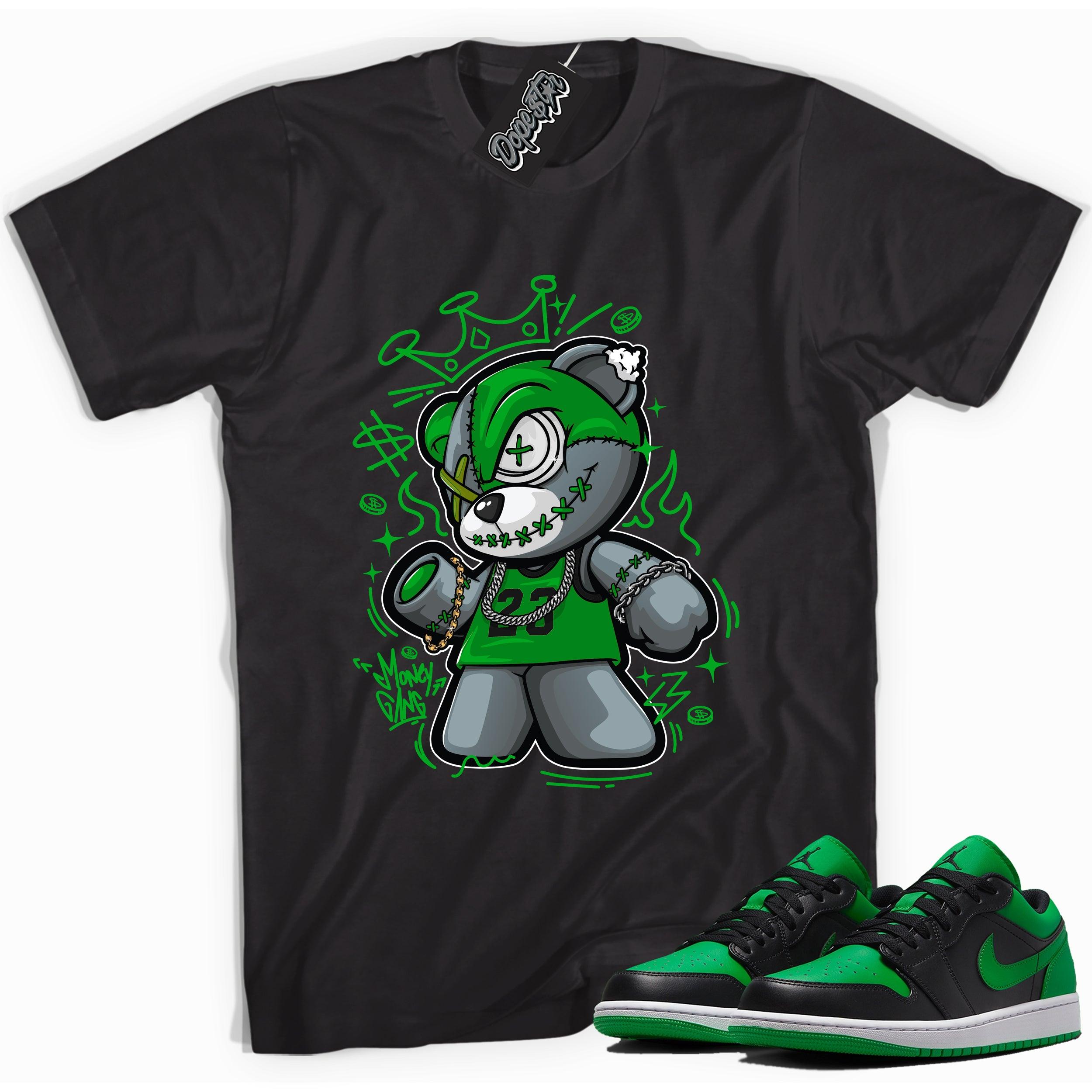 Cool black graphic tee with 'money gang bear' print, that perfectly matches Air Jordan 1 Low Lucky Green sneakers