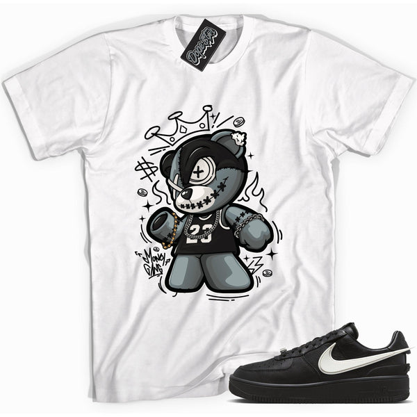 Cool white graphic tee with 'money gang bear' print, that perfectly matches Nike Air Force 1 Low SP Ambush Phantom sneakers.