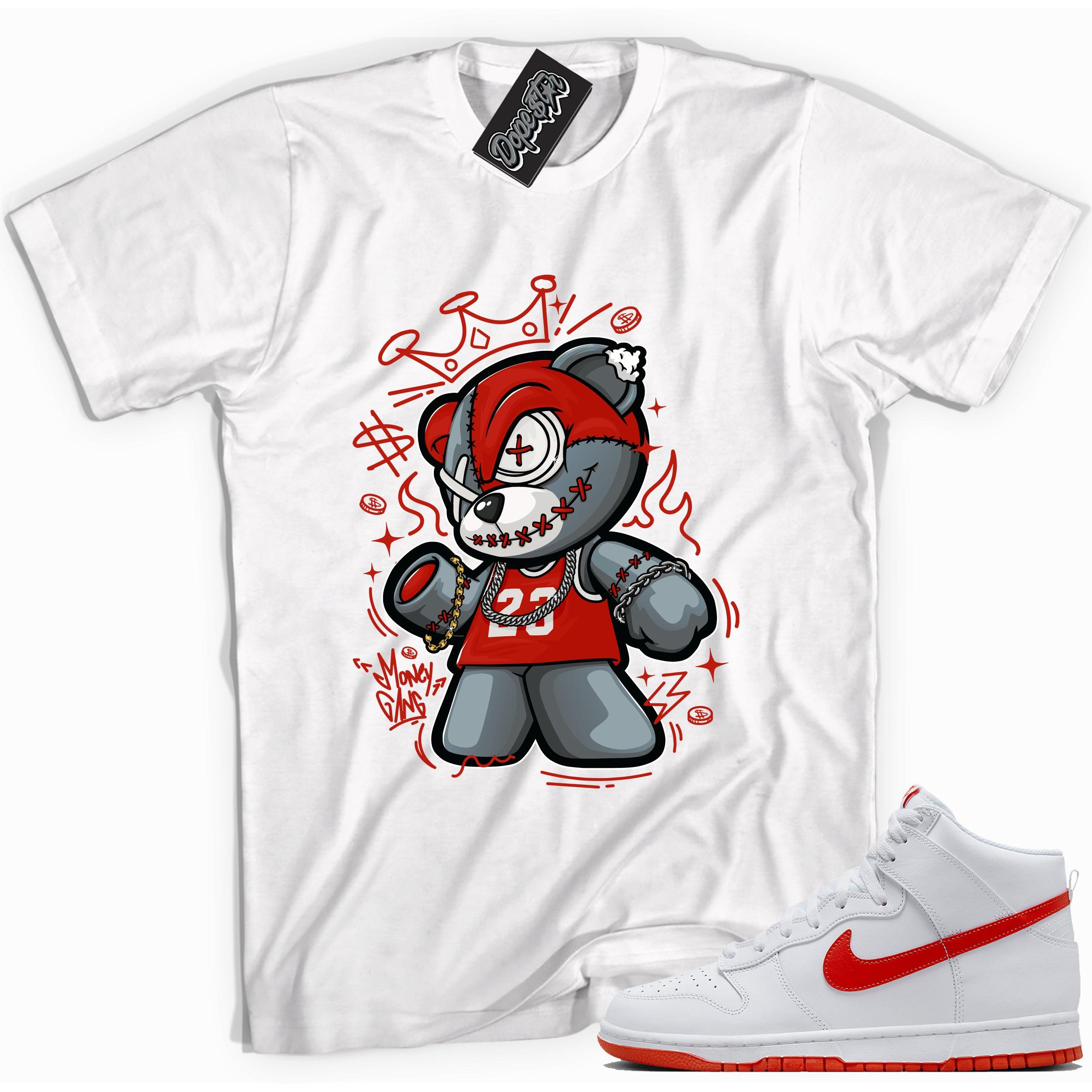 Cool white graphic tee with 'money gang bear' print, that perfectly matches Nike Dunk High White Picante Red sneakers.