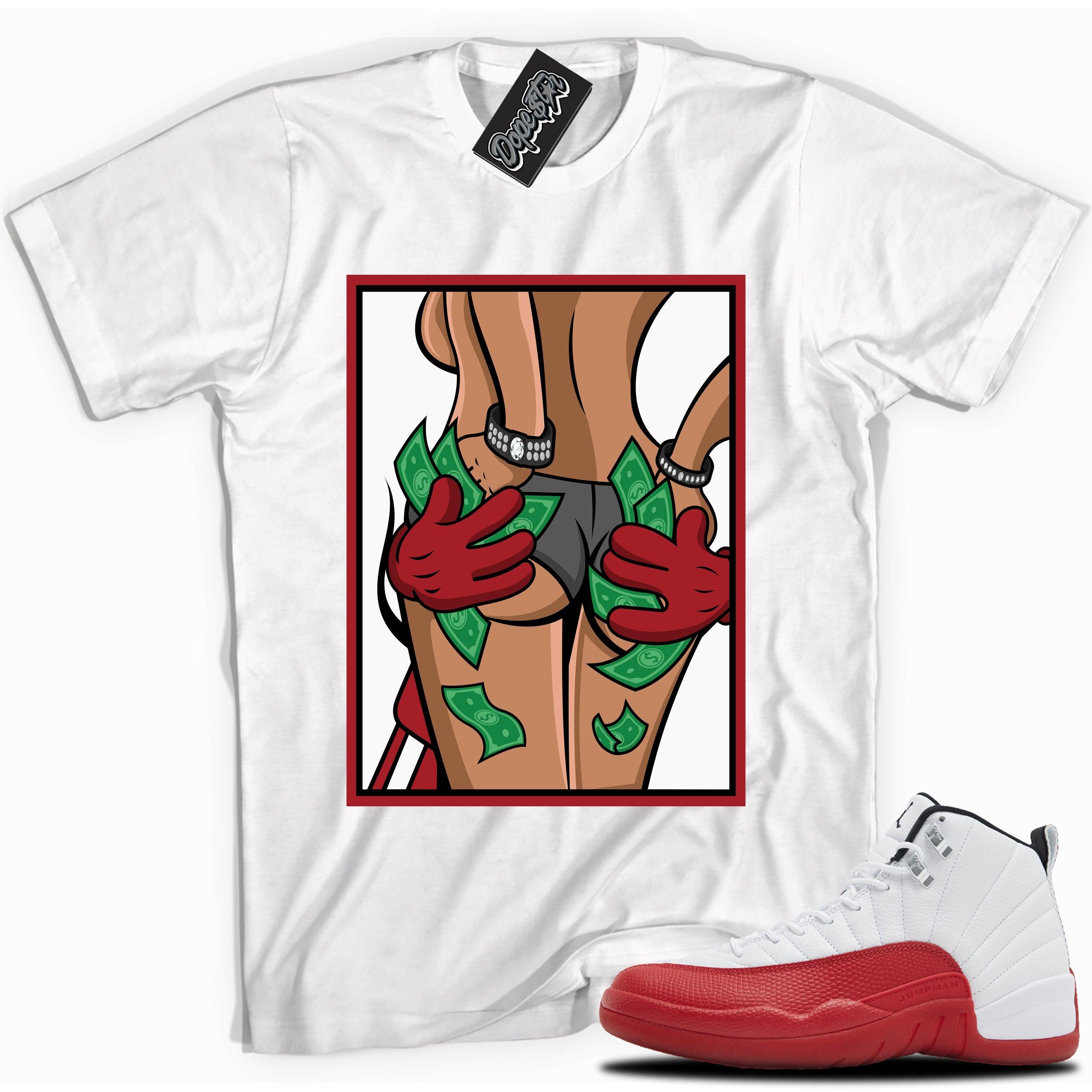 Cool White graphic tee with “  Money Hands  ” print, that perfectly matches Air Jordan 12 Retro Cherry Red 2023 red and white sneakers 