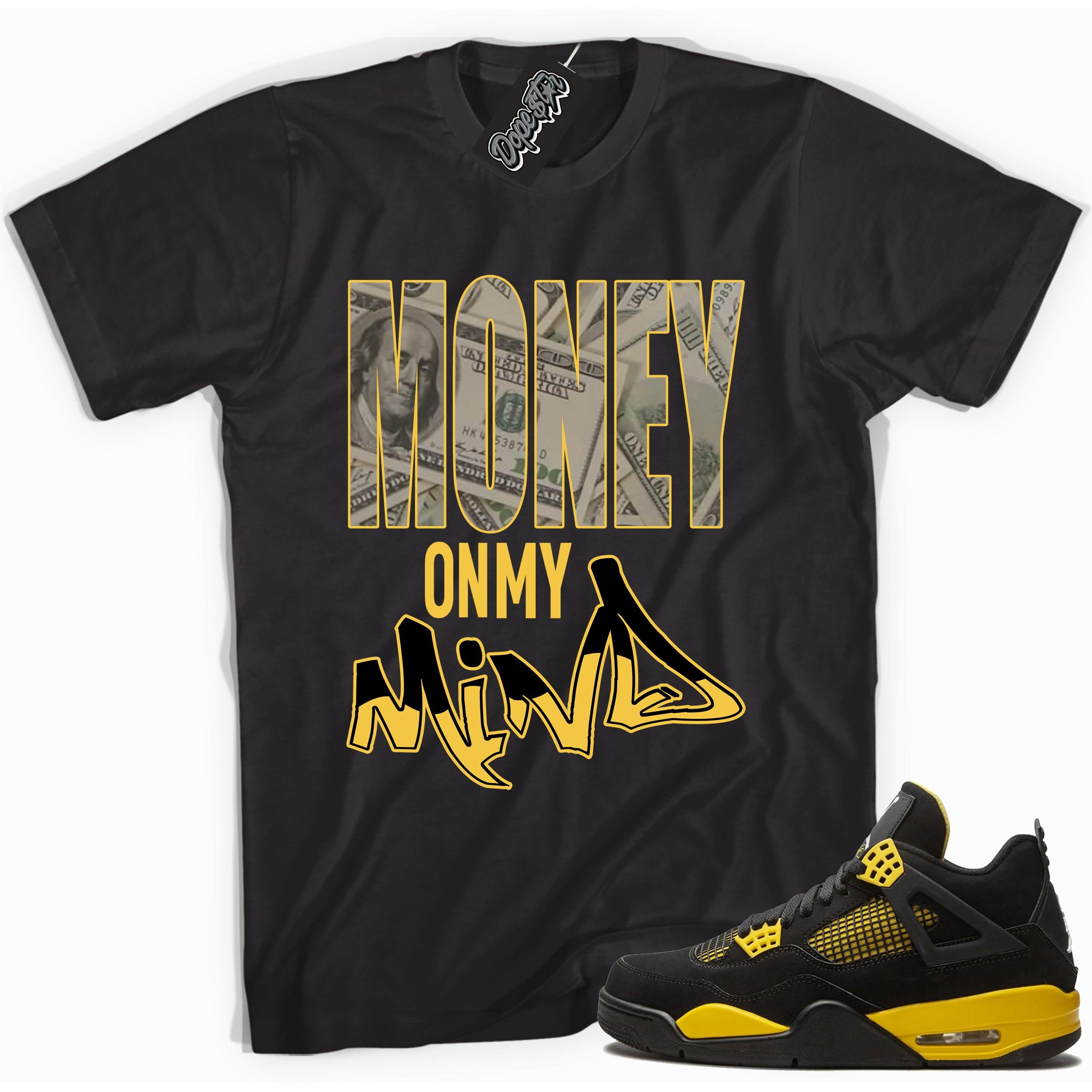 Cool black graphic tee with 'money on mind' print, that perfectly matches  Air Jordan 4 Thunder sneakers