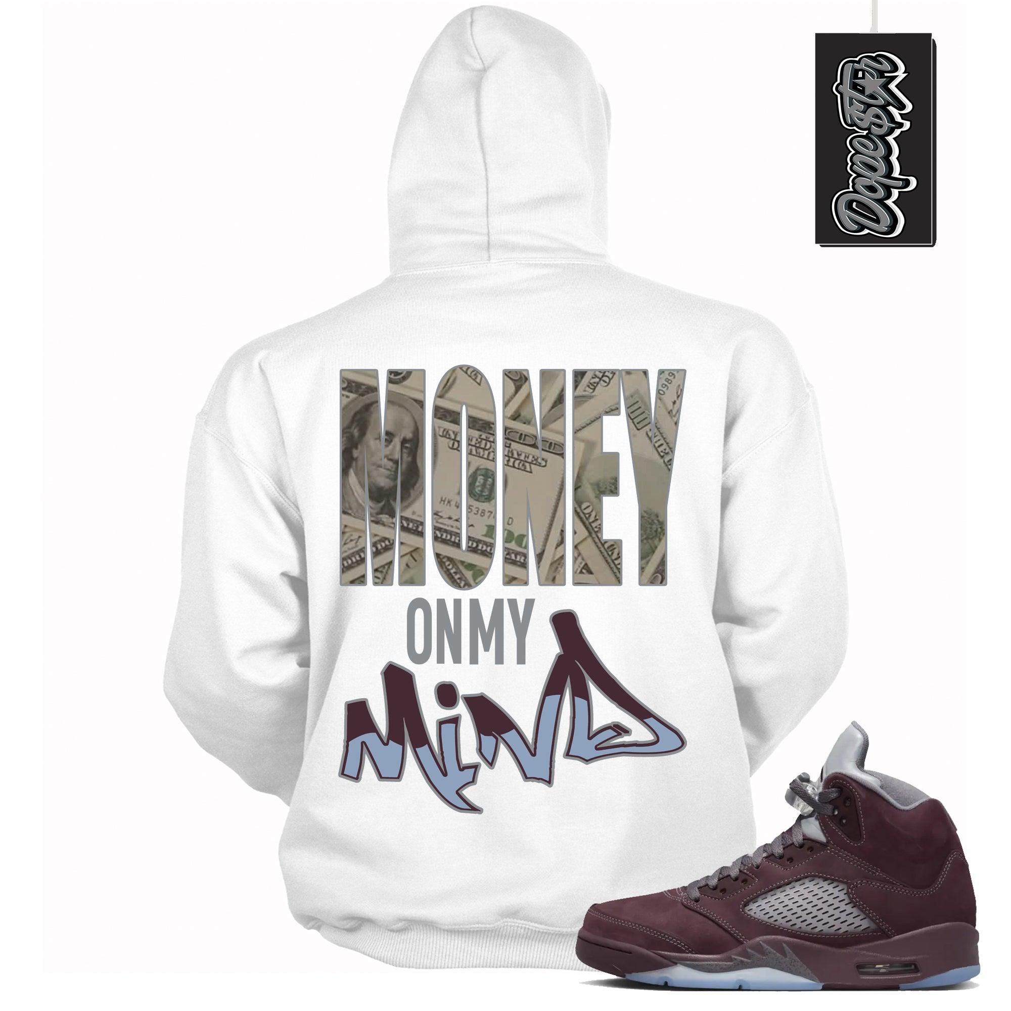 Cool White Graphic Hoodie with “ Money On My Mind “ print, that perfectly matches Air Jordan 5 Burgundy 2023 sneakers