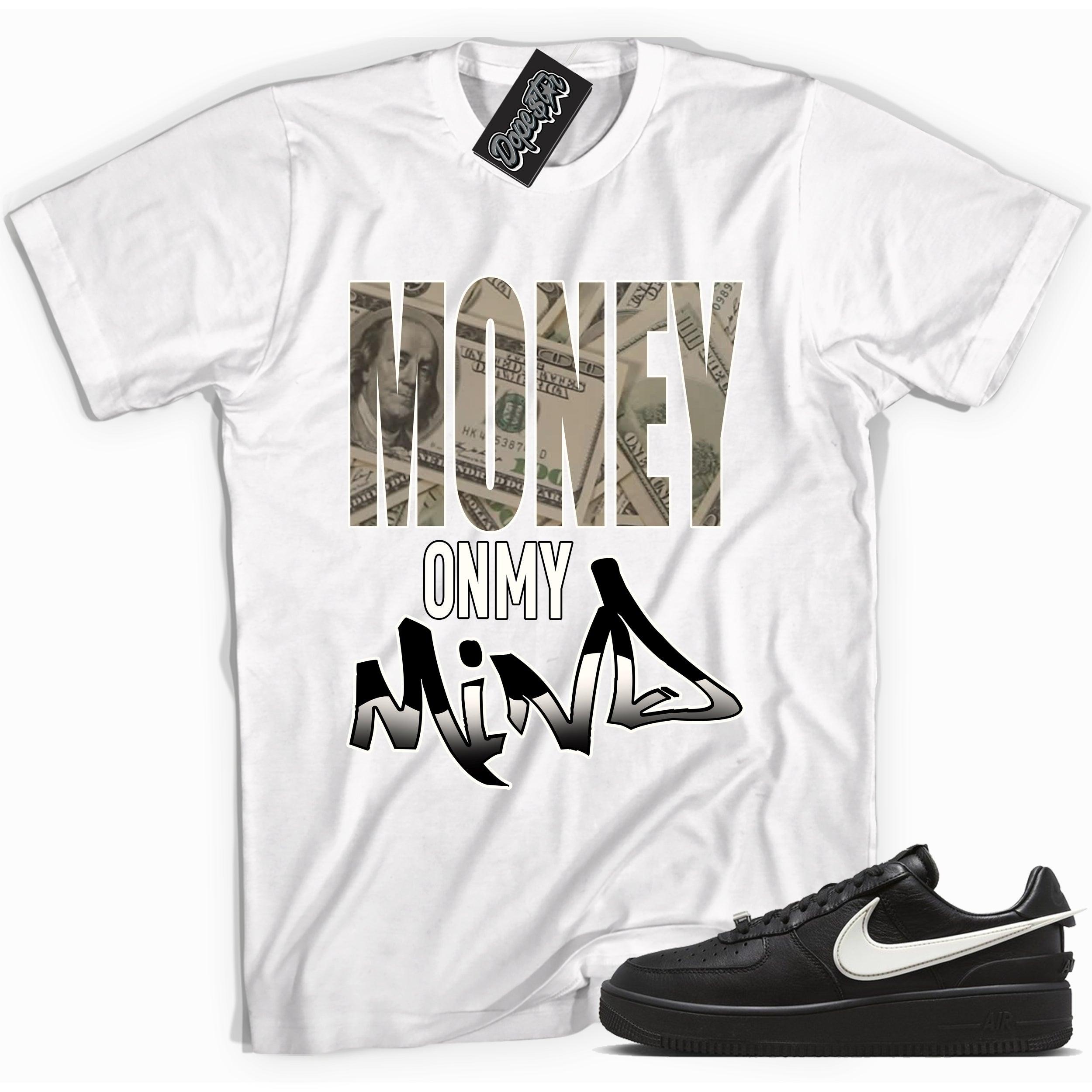 Cool white graphic tee with 'money on my mind' print, that perfectly matches Nike Air Force 1 Low SP Ambush Phantom sneakers.