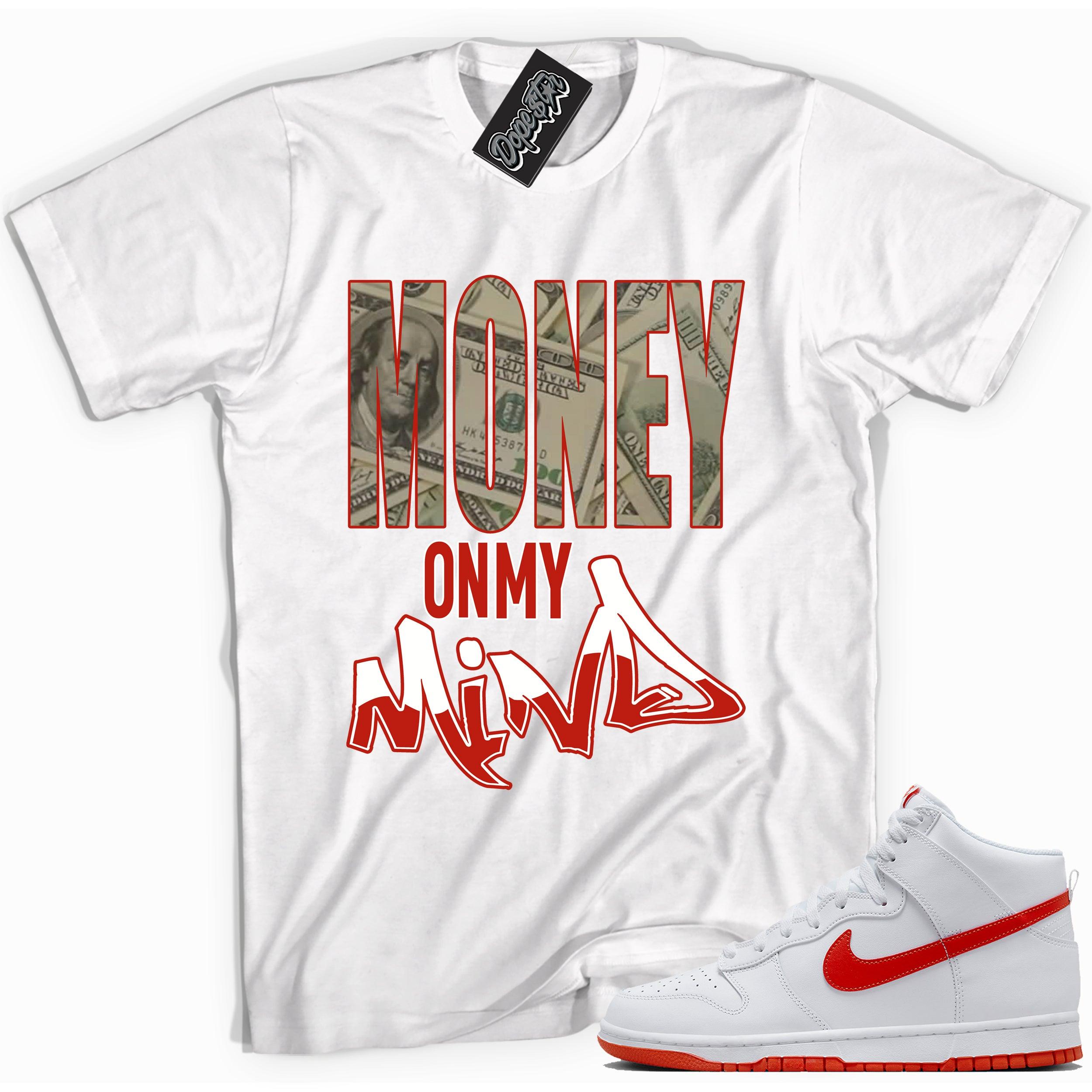 Cool white graphic tee with 'money on my mind' print, that perfectly matches Nike Dunk High White Picante Red sneakers.