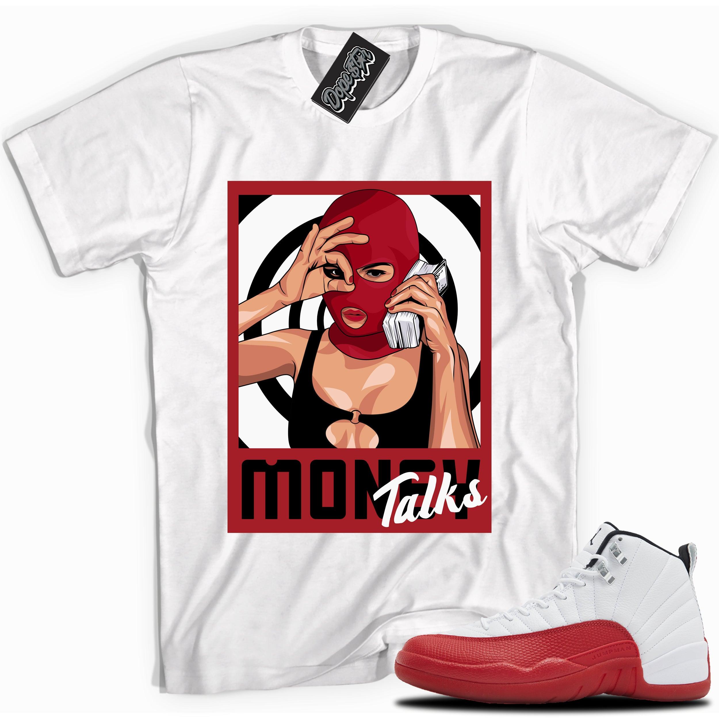 Cool White graphic tee with “ Money Talks  ” print, that perfectly matches Air Jordan 12 Retro Cherry Red 2023 red and white sneakers 