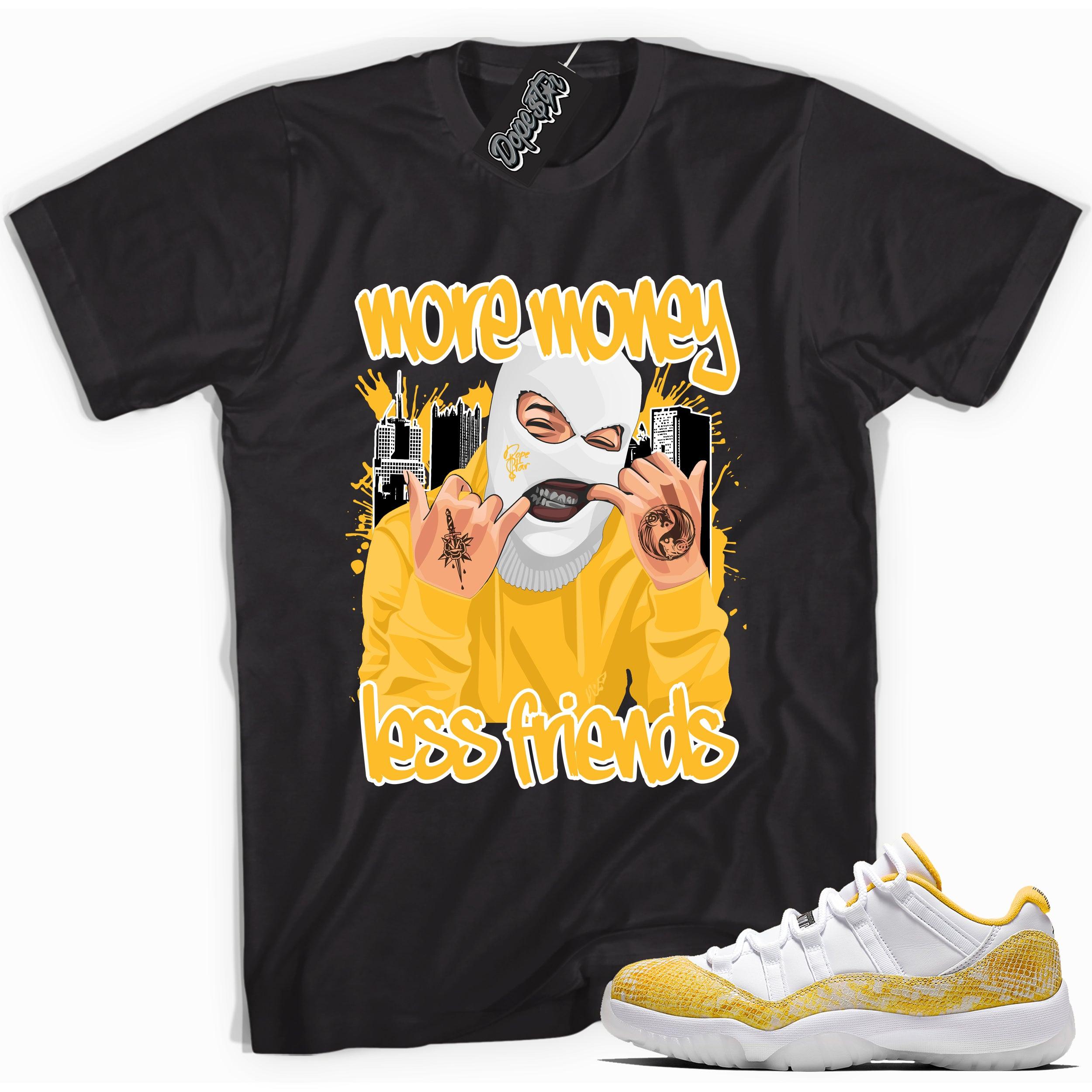 Cool black graphic tee with 'more money less friends' print, that perfectly matches  Air Jordan 11 Low Yellow Snakeskin sneakers