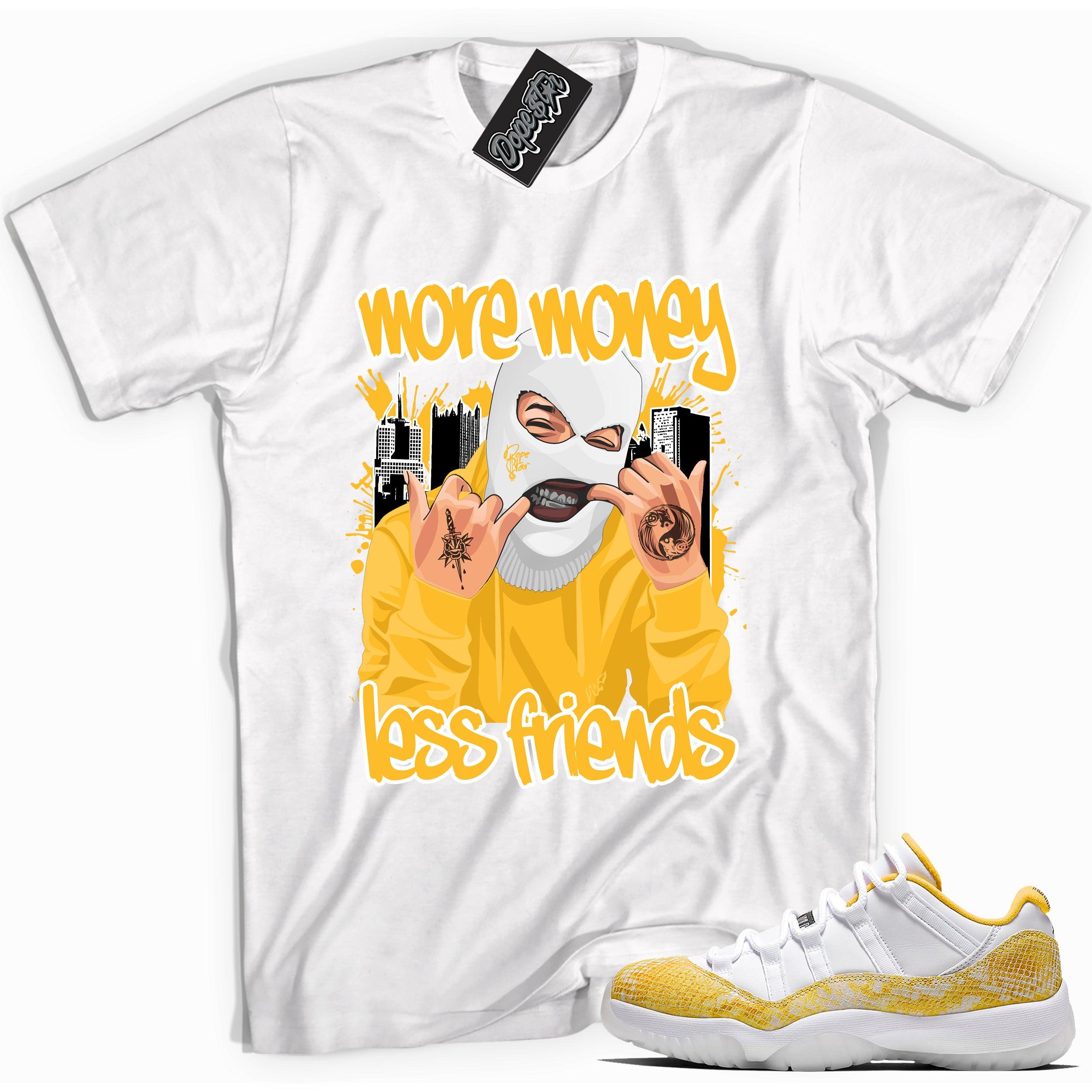 Cool white graphic tee with 'more money less friends' print, that perfectly matches Air Jordan 11 Low Yellow Snakeskin sneakers