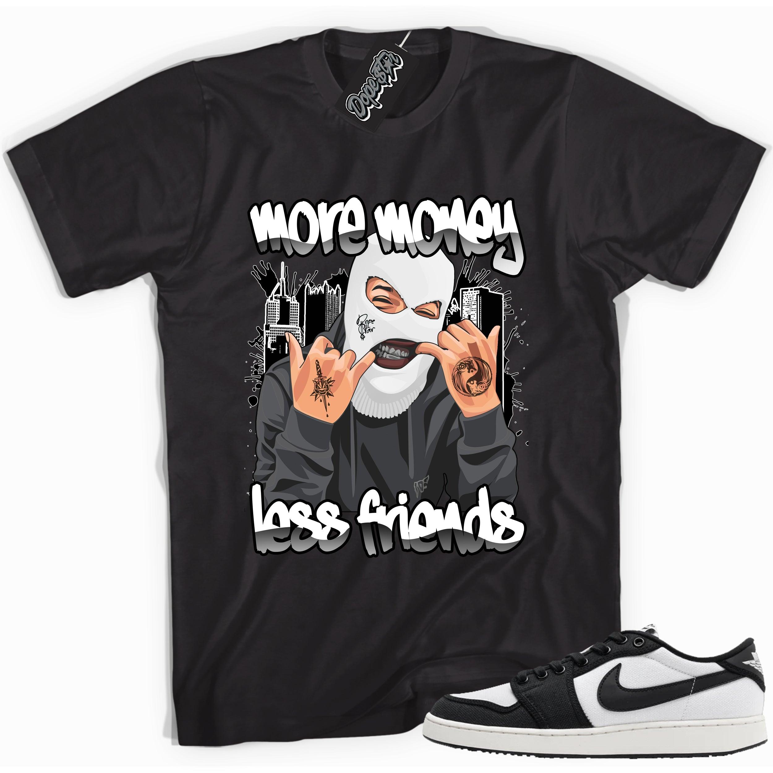 Cool black graphic tee with 'more money less friends' print, that perfectly matches Air Jordan 1 Retro Ajko Low Black & White sneakers.