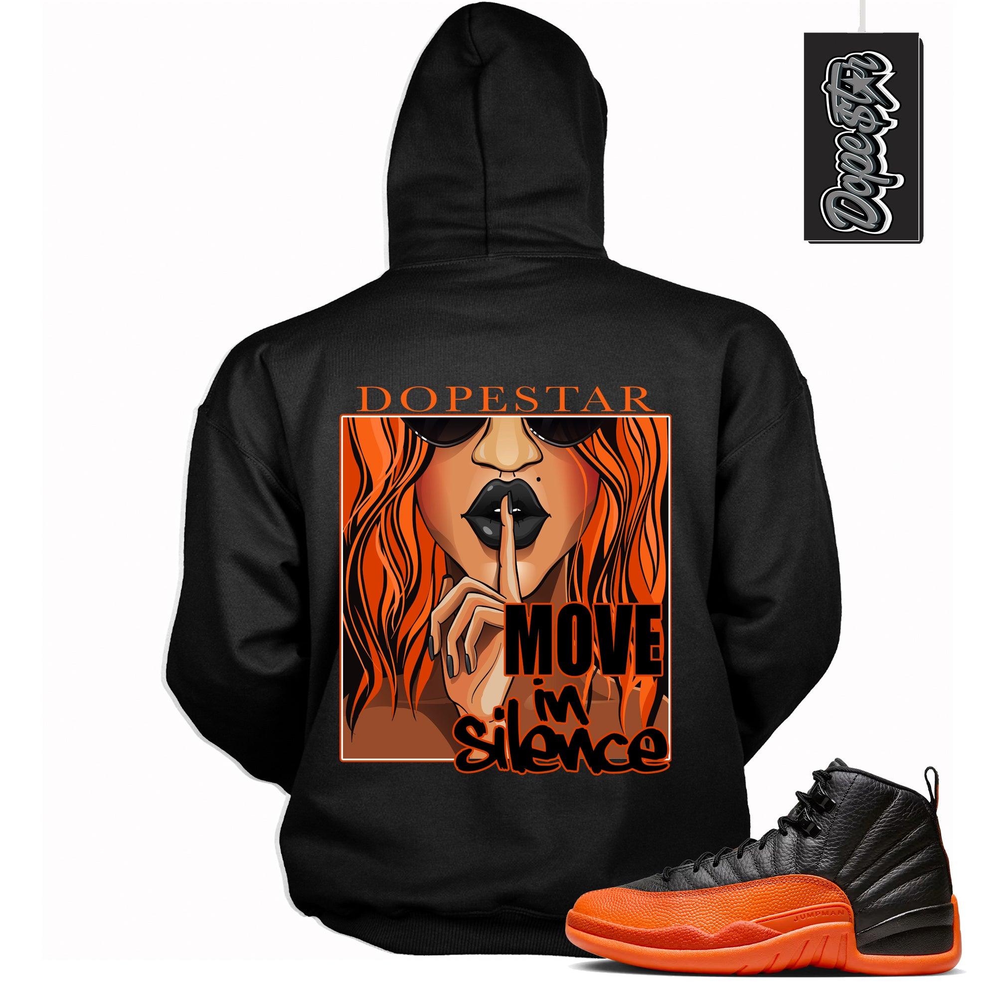 Cool Black Graphic Hoodie with “ Move In Silence “ print, that perfectly matches Air Jordan 12 Retro WNBA All-Star Brilliant Orange  sneakers