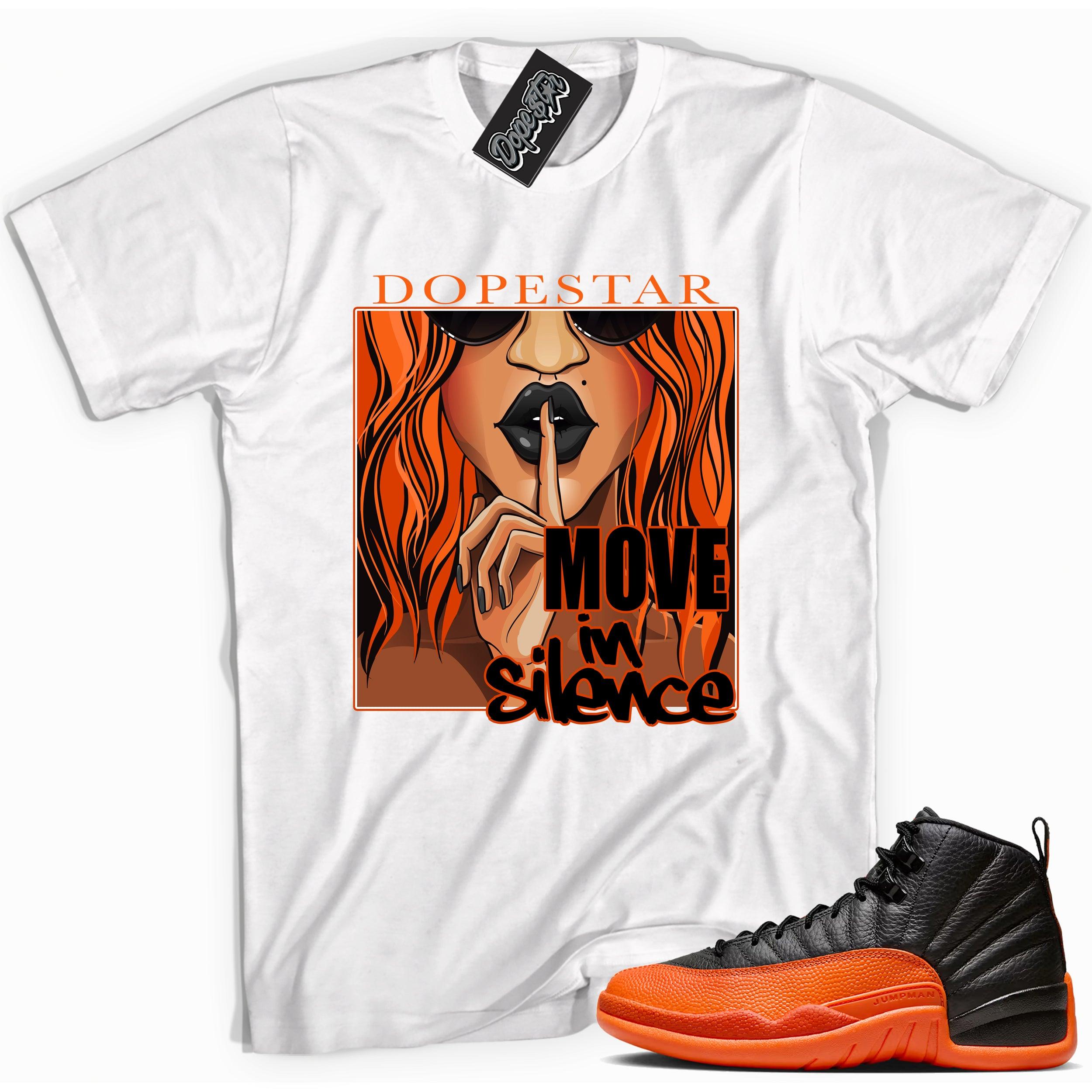 Cool White graphic tee with “ Move In Silence ” print, that perfectly matches Air Jordan 12 Retro WNBA All-Star Brilliant Orange sneakers 