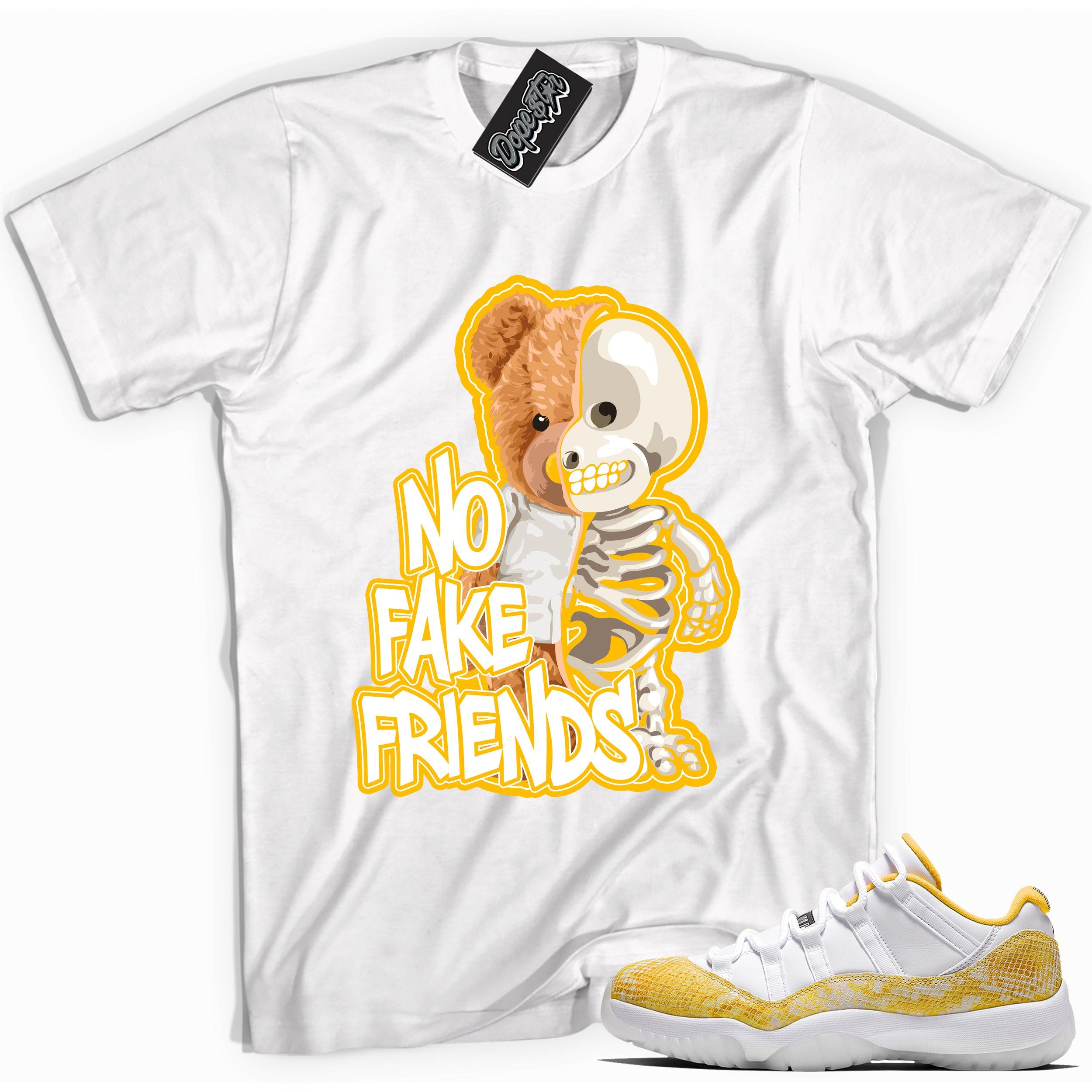Cool white graphic tee with 'no fake friends' print, that perfectly matches Air Jordan 11 Low Yellow Snakeskin sneakers