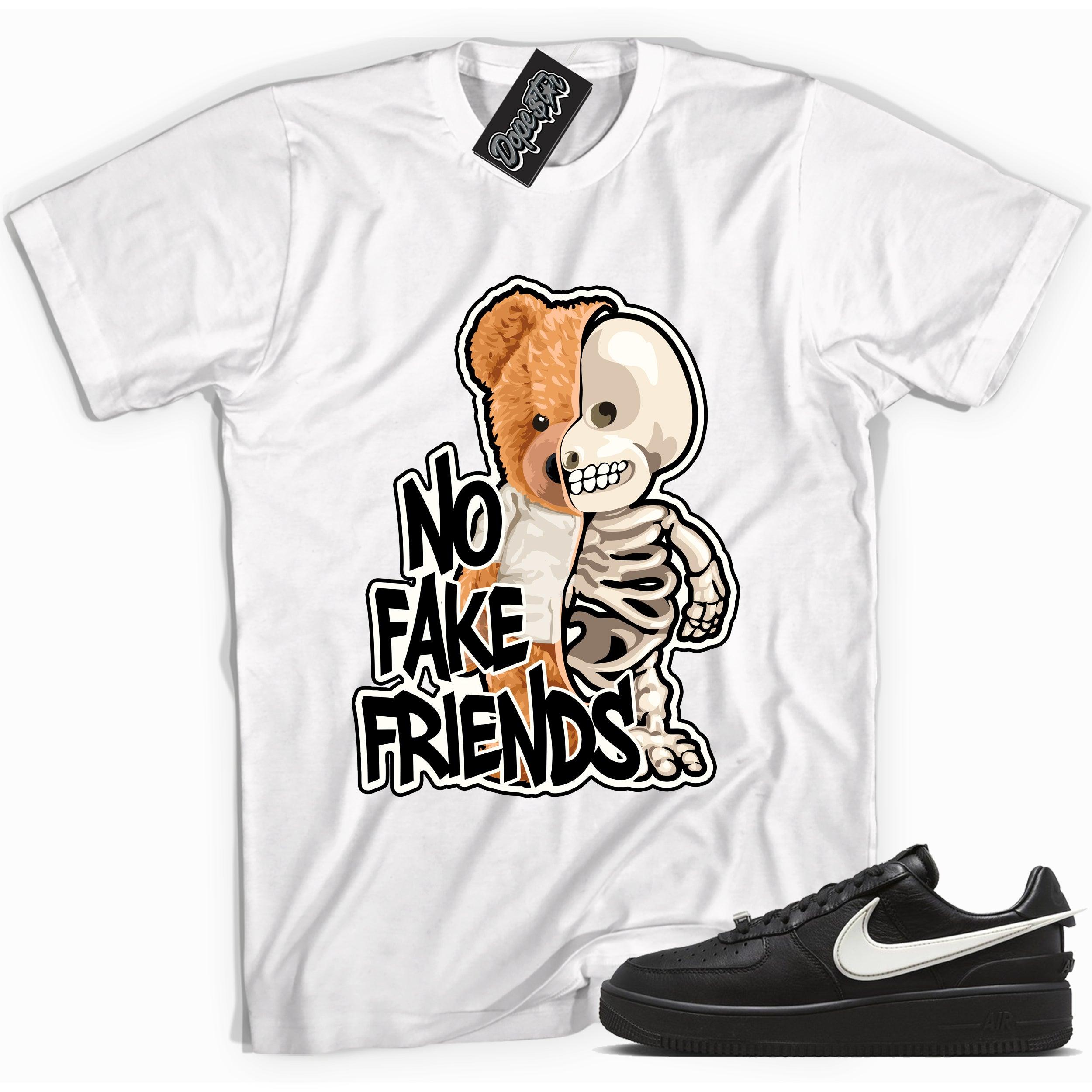 Cool white graphic tee with 'no fake friends skeleton bear' print, that perfectly matches Nike Air Force 1 Low SP Ambush Phantom sneakers.