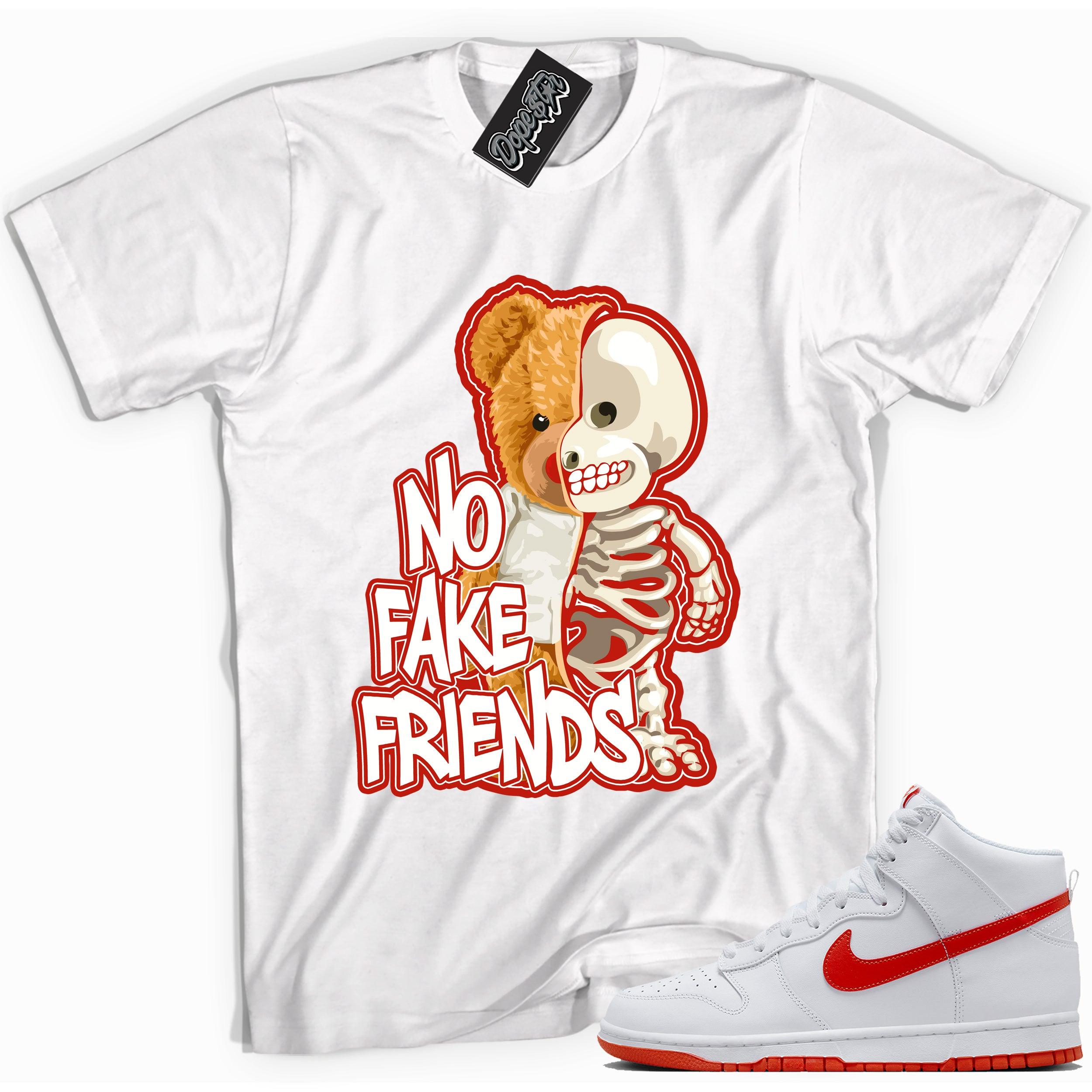 Cool white graphic tee with 'no fake friends' print, that perfectly matches Nike Dunk High White Picante Red sneakers.