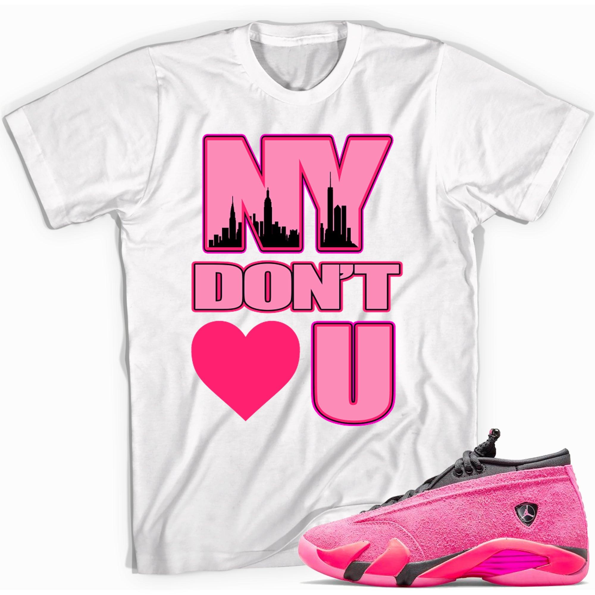 Cool White graphic tee with “ NY Dont Love U ” print, that perfectly matches Air Jordan 14 Shocking Pink sneakers 