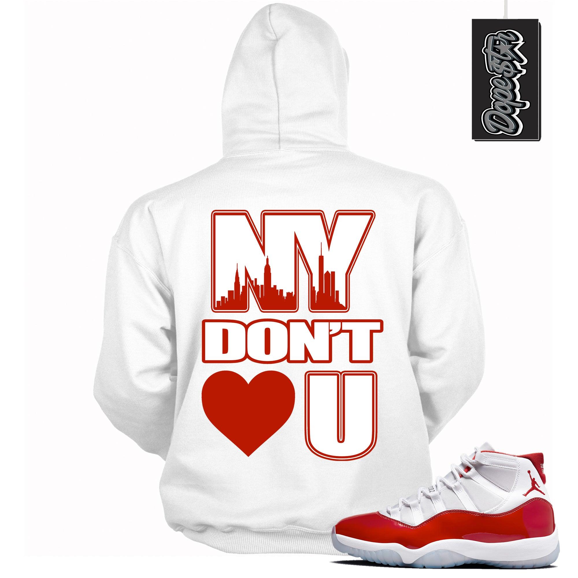 Cool White Graphic Hoodie with “ NY Don’t Love U “ print, that perfectly matches Air Jordan 11 Cherry sneakers