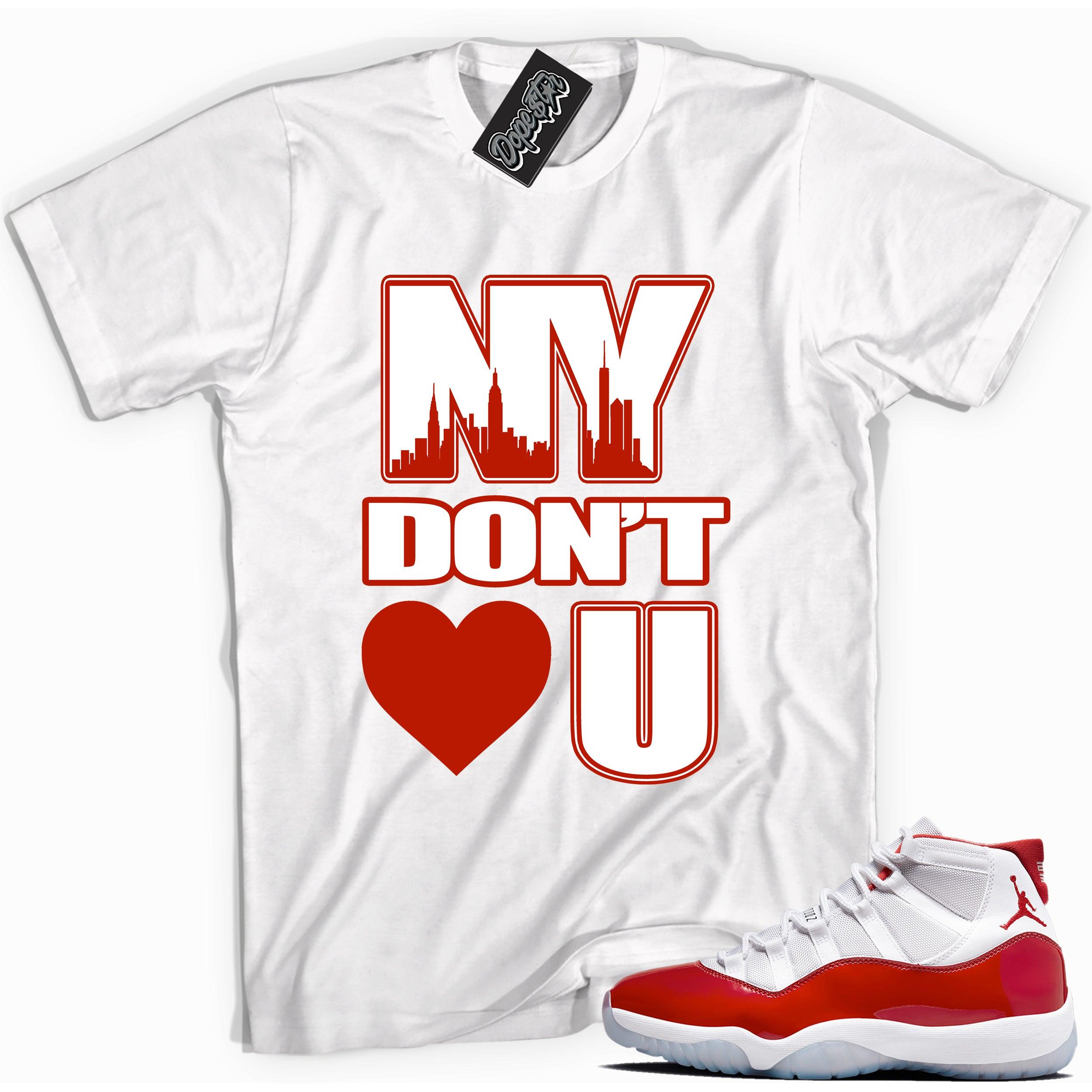 Cool White graphic tee with “ NY Don’t Love U ” print, that perfectly matches Air Jordan 11 Cherry sneakers 