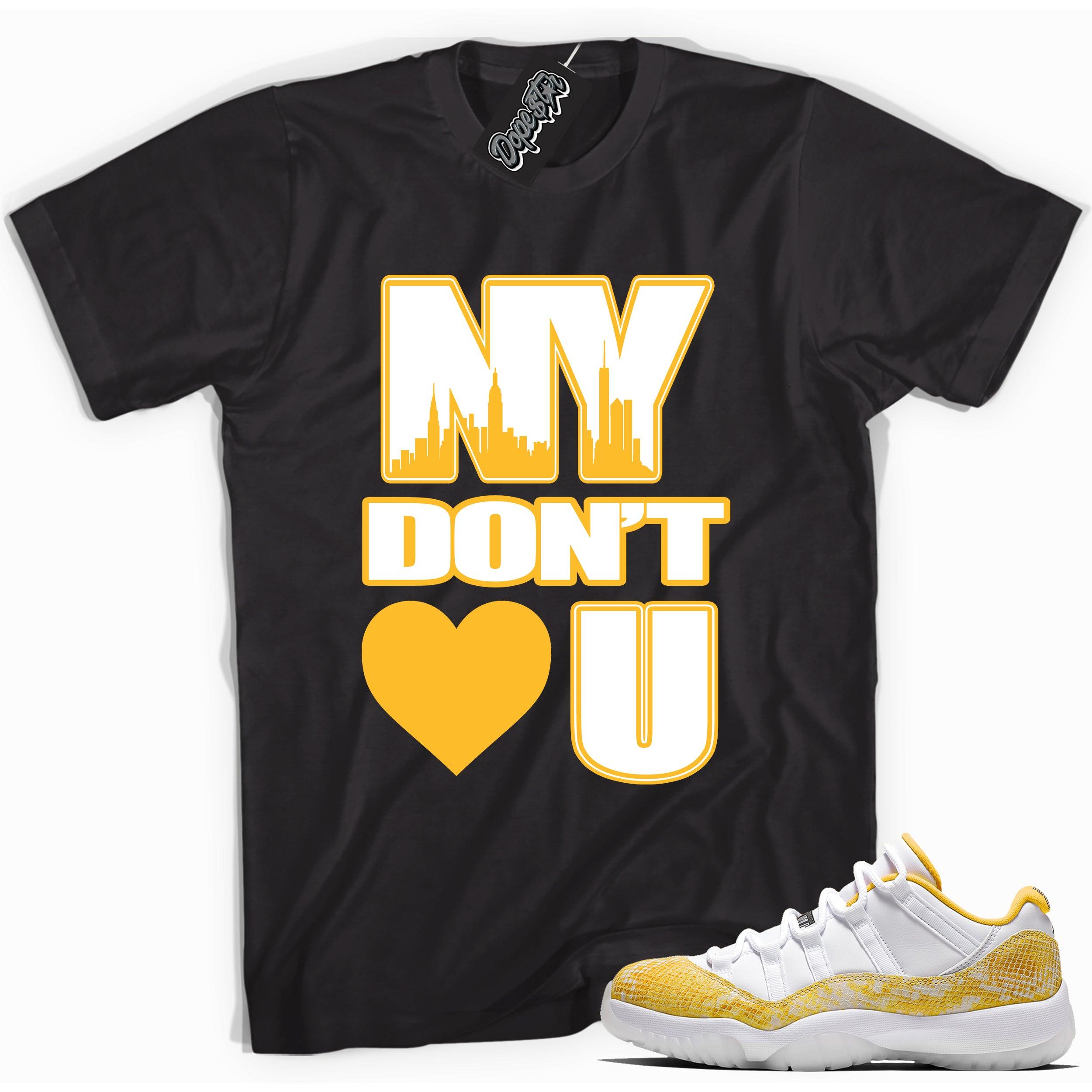 Cool black graphic tee with 'NY Don't <3 U' print, that perfectly matches  Air Jordan 11 Low Yellow Snakeskin sneakers