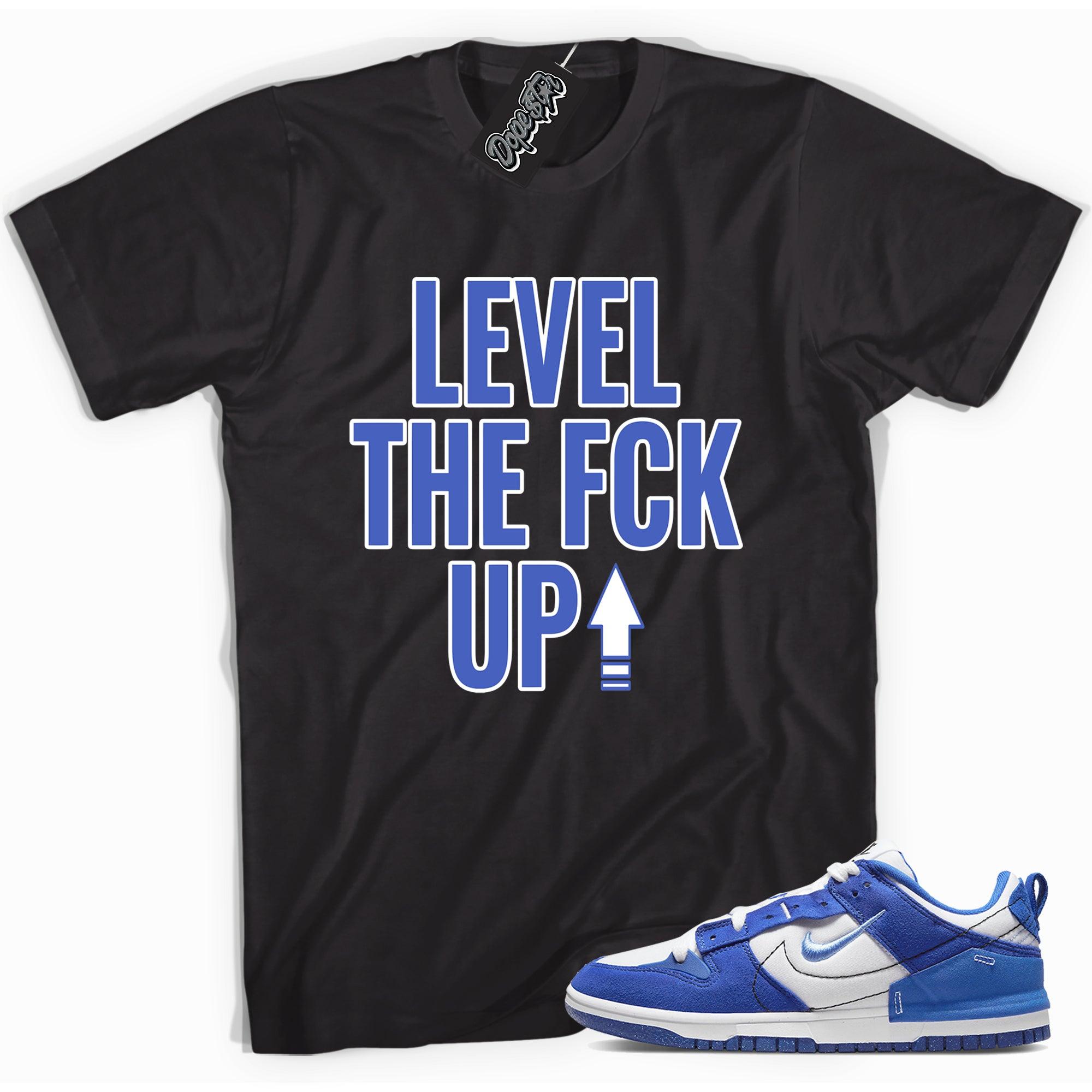 Cool black graphic tee with 'Level Up' print, that perfectly matches Nike Dunk Low Disrupt 2 Hyper Royal sneakers.