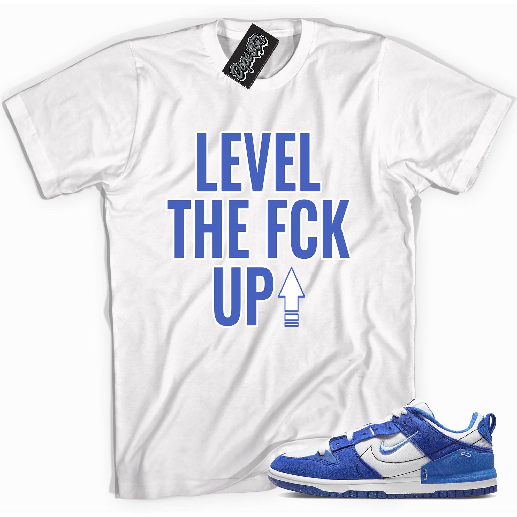 Cool white graphic tee with 'Level Up' print, that perfectly matches Nike Dunk Low Disrupt 2 Hyper Royal sneakers.