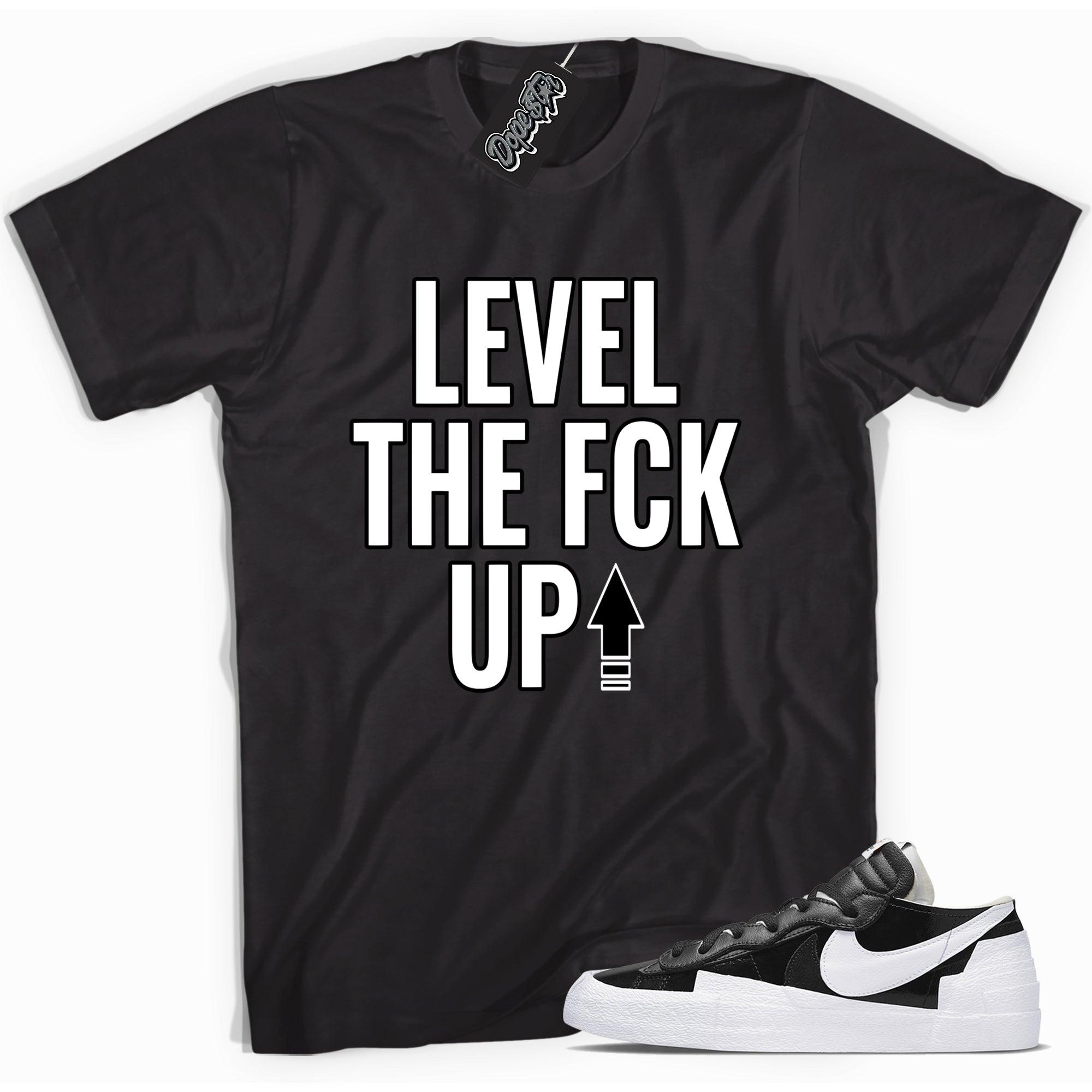 Cool black graphic tee with 'level up' print, that perfectly matches Nike Dunk Low Essential Black Paisley sneakers.