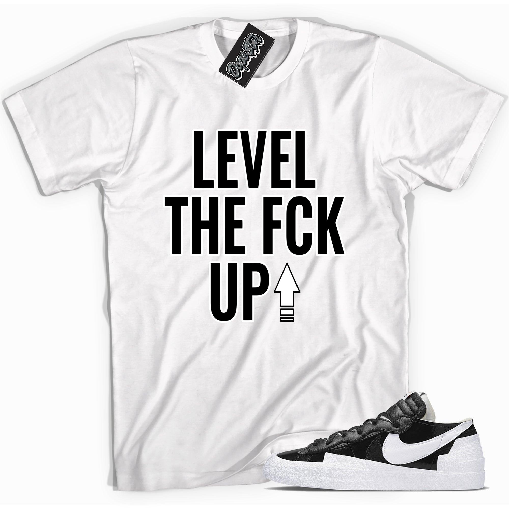 Cool white graphic tee with 'level up' print, that perfectly matches Nike Dunk Low Essential Black Paisley sneakers.