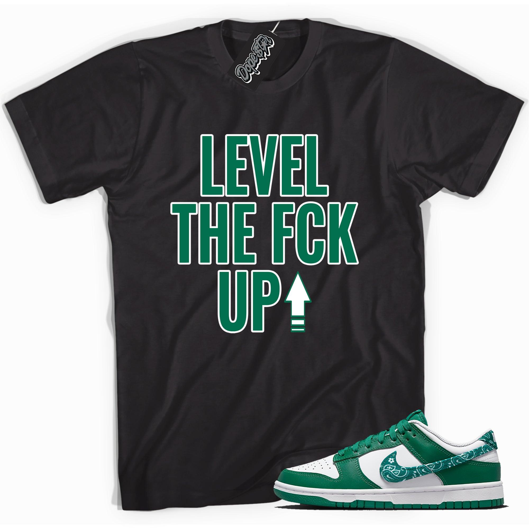 Cool black graphic tee with 'level up' print, that perfectly matches Nike Dunk Low Essential Paisley Pack Green sneakers.