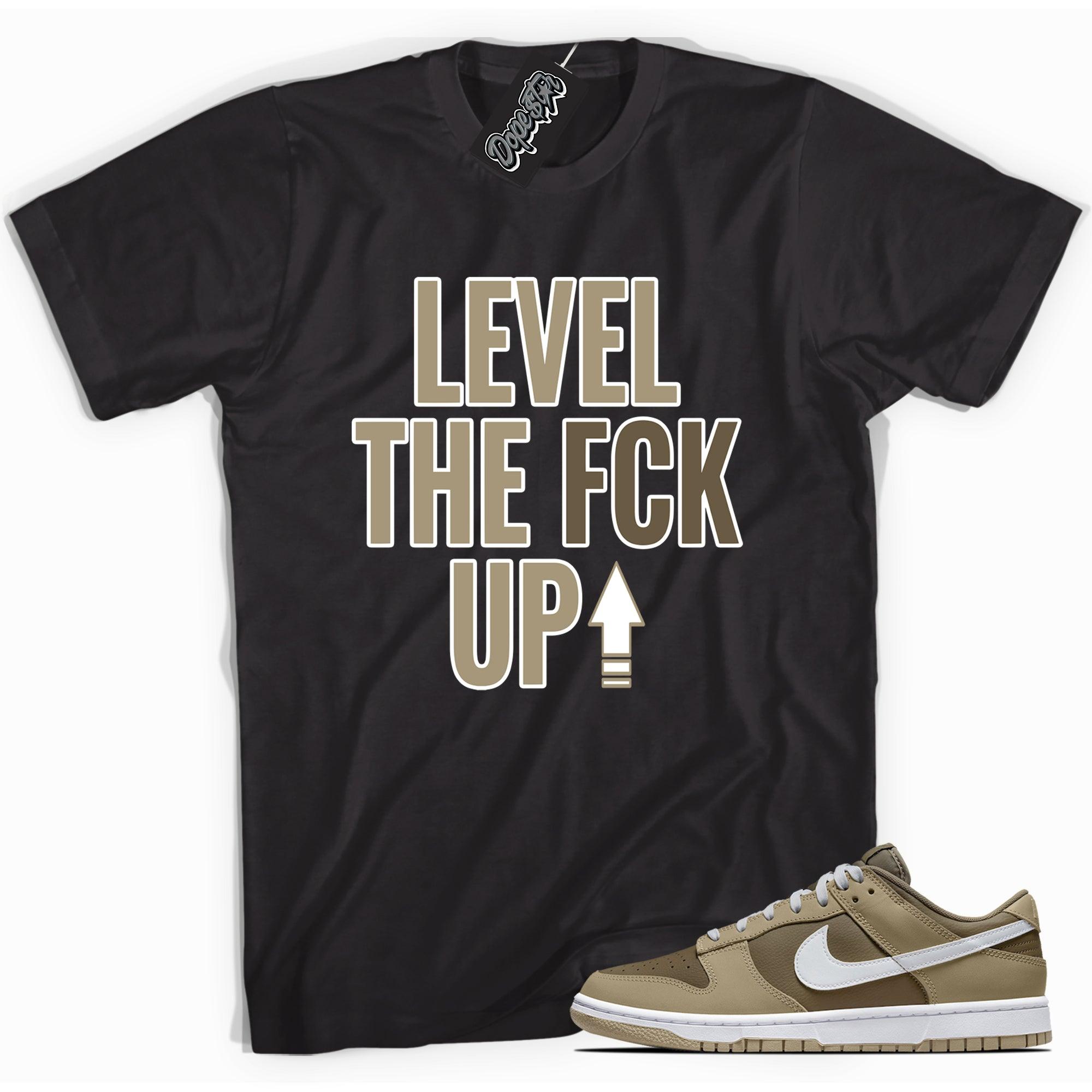 Cool black graphic tee with 'Level Up' print, that perfectly matches Nike Dunk Low Judge Grey sneakers.