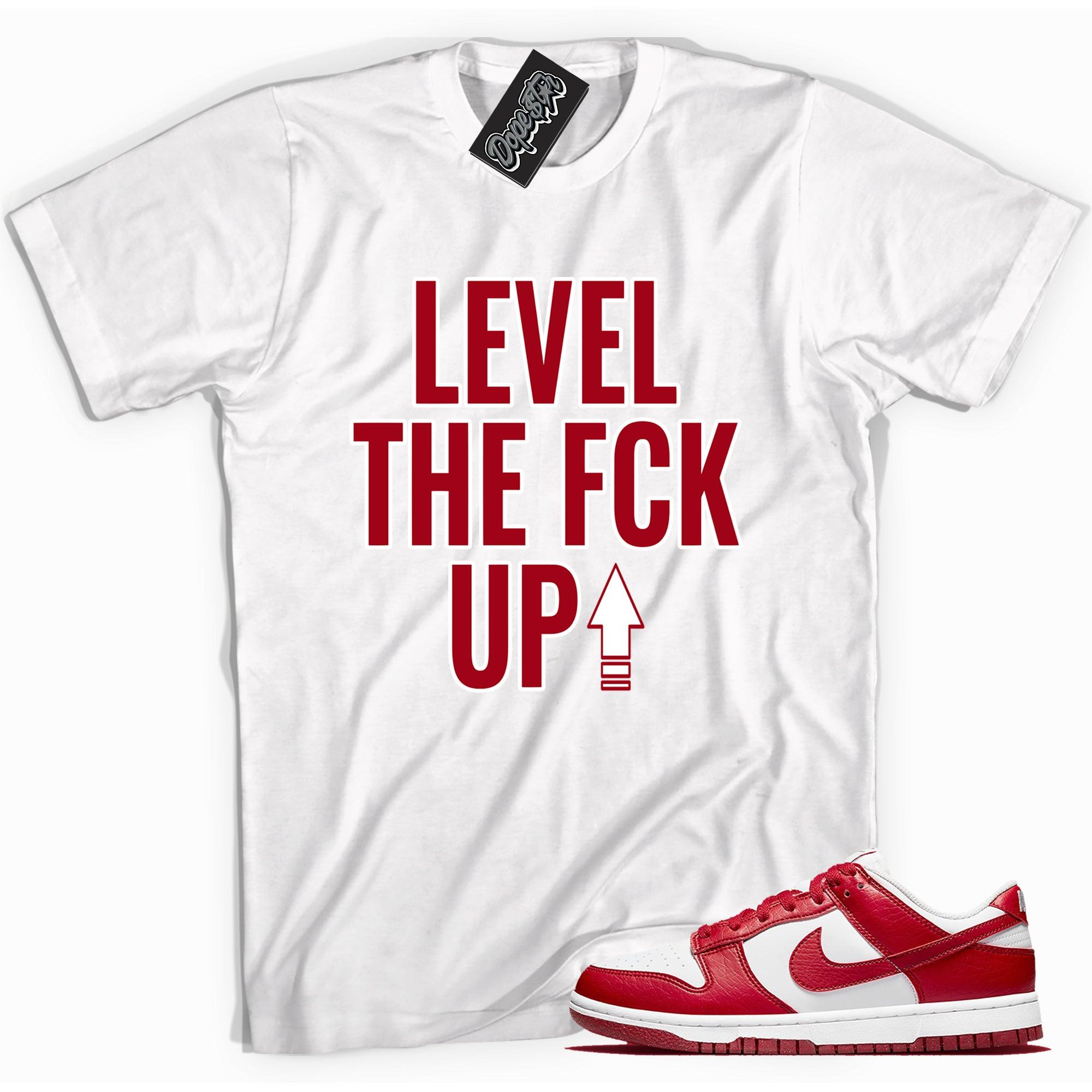 Cool white graphic tee with 'Level Up' print, that perfectly matches Nike Dunk Low Next Nature White Gym Red sneakers.