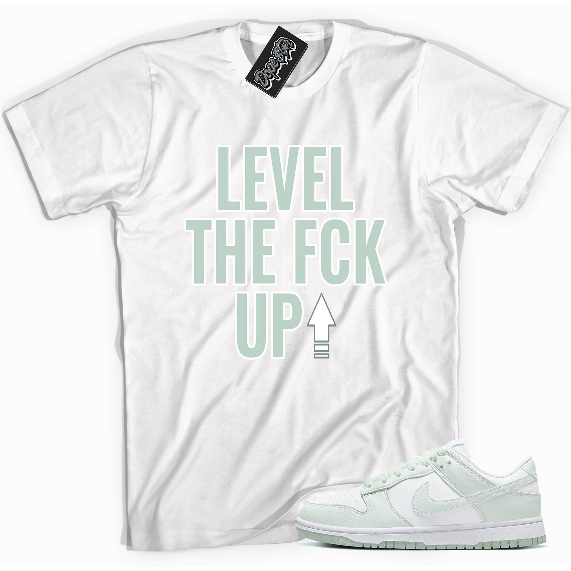 Cool white graphic tee with 'level up' print, that perfectly matches Nike Dunk Low Next Nature White Mint sneakers.