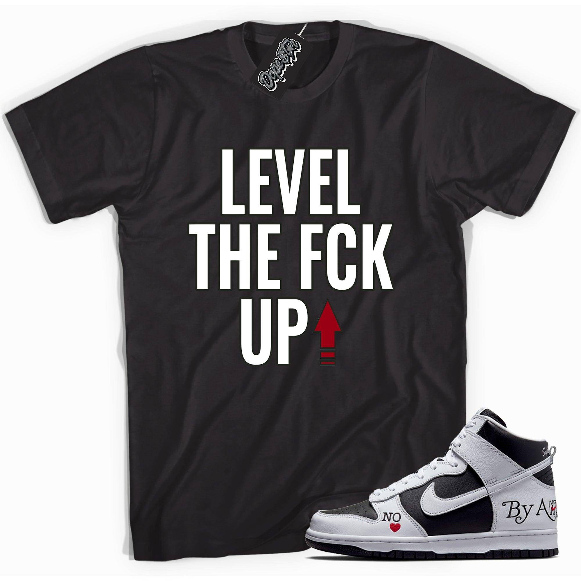 Cool black graphic tee with 'Level Up' print, that perfectly matches Nike SB Dunk High Supreme Toe sneakers.