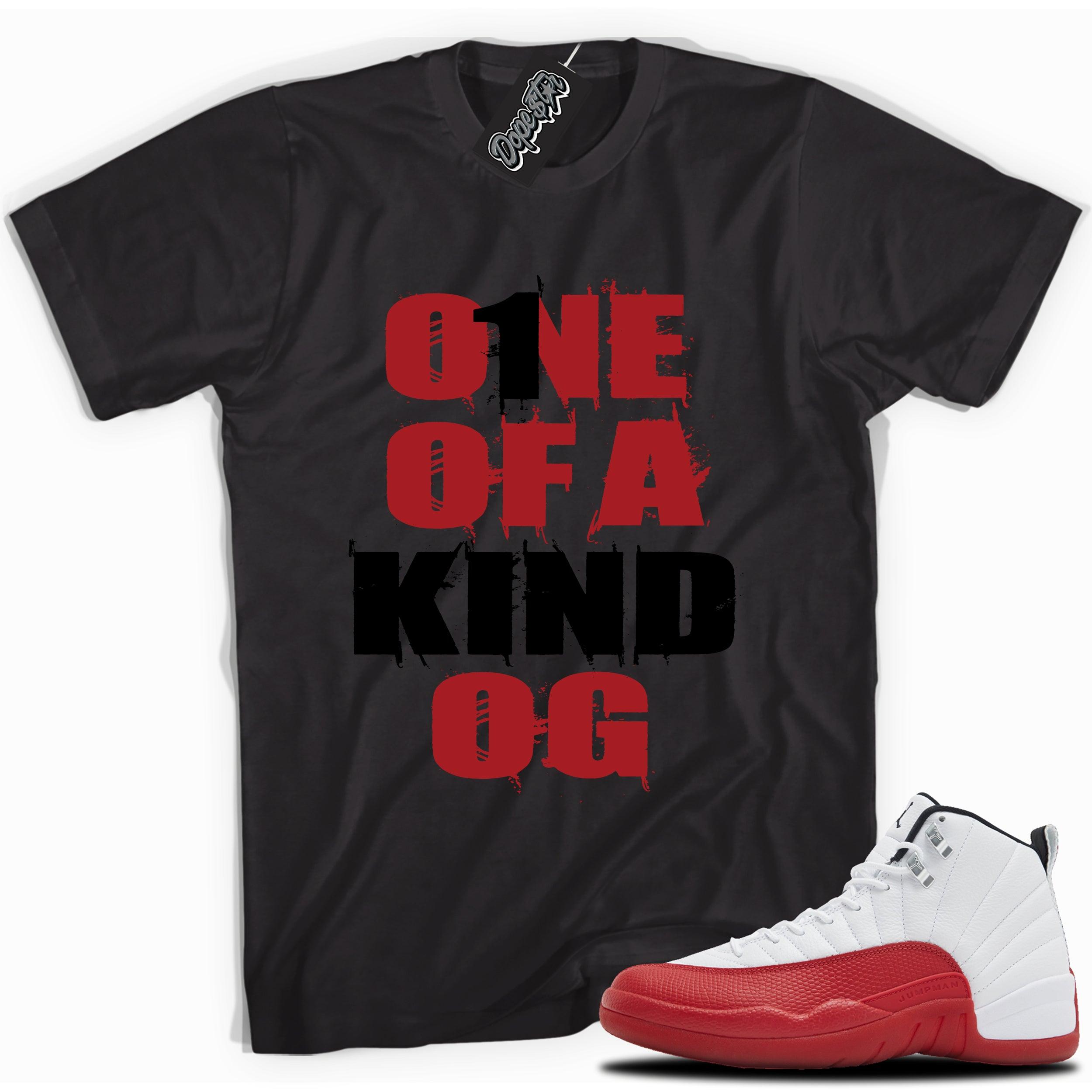 Cool Black graphic tee with “ONE OF A KIND OG” print, that perfectly matches Air Jordan 12 Retro Cherry Red 2023 red and white sneakers 