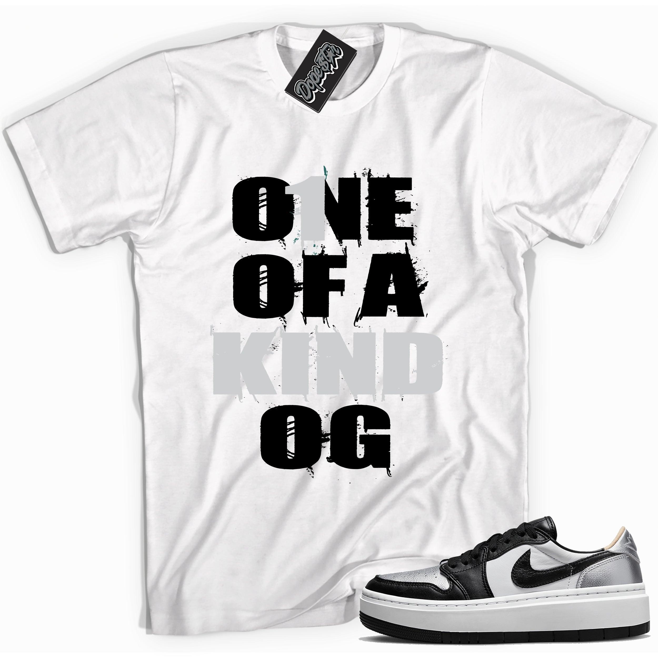 Cool white graphic tee with 'one of a kind' print, that perfectly matches Air Jordan 1 Elevate Low SE Silver Toe sneakers.