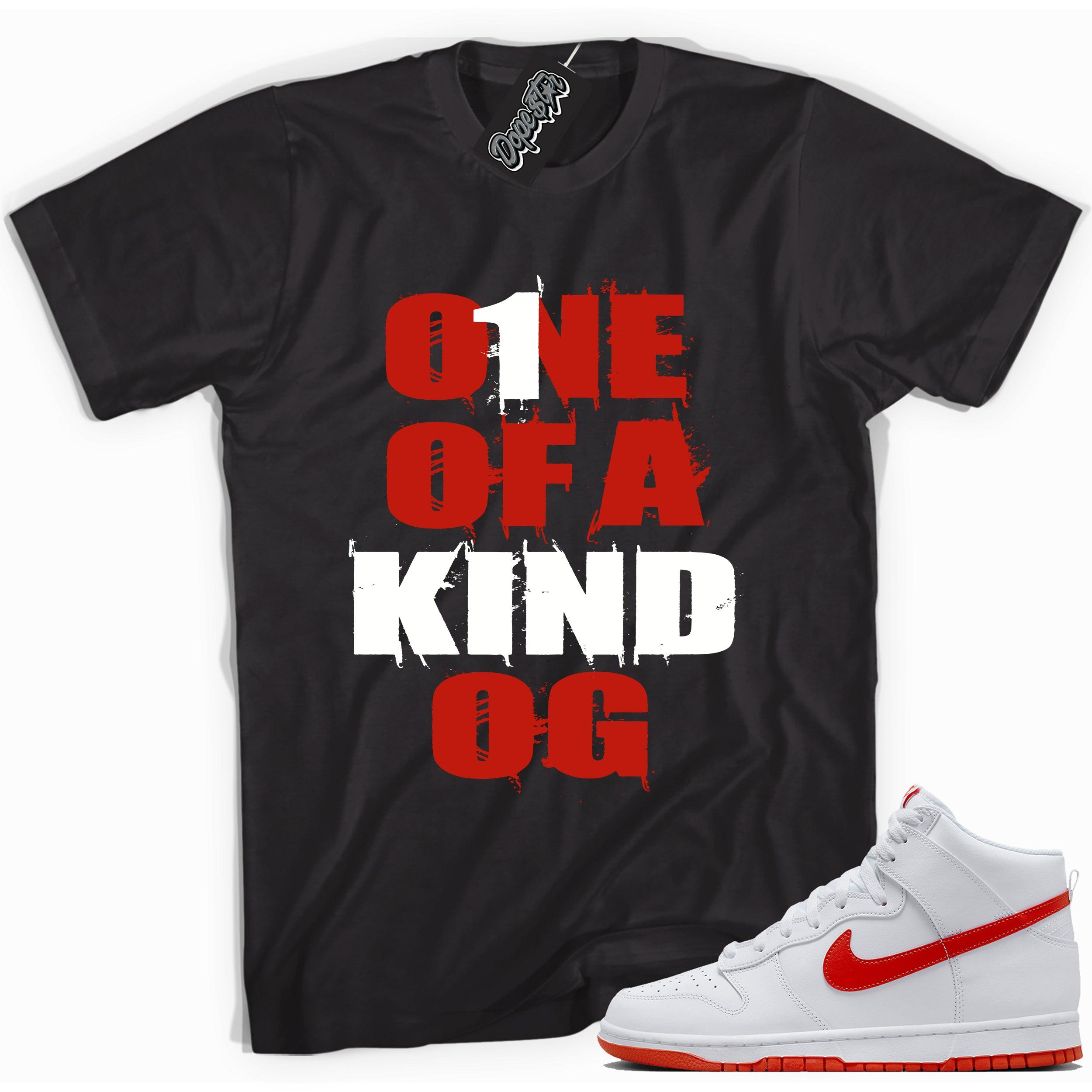 Cool black graphic tee with 'one of kind OG' print, that perfectly matches Nike Dunk High White Picante Red sneakers.