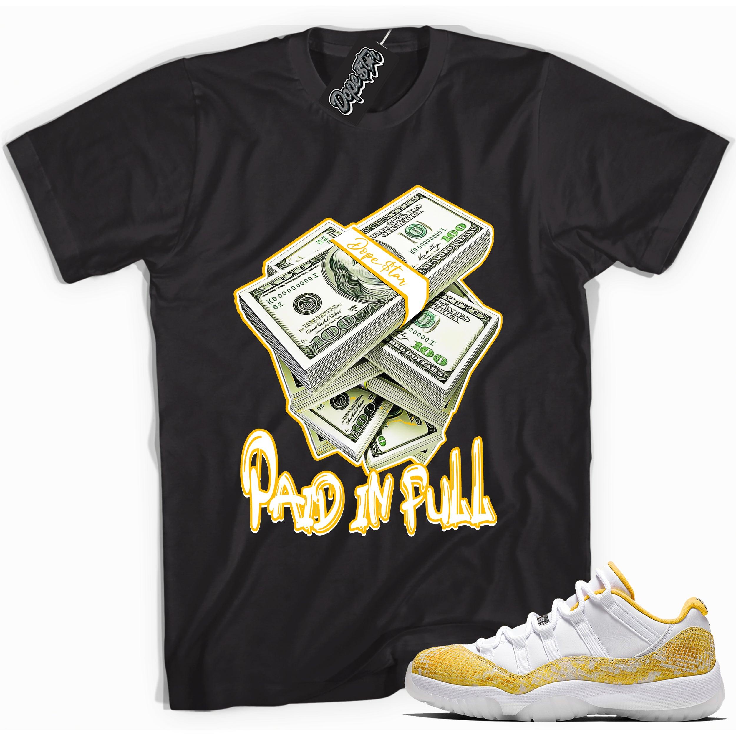 Cool black graphic tee with 'paid in full' print, that perfectly matches  Air Jordan 11 Retro Low Yellow Snakeskin sneakers