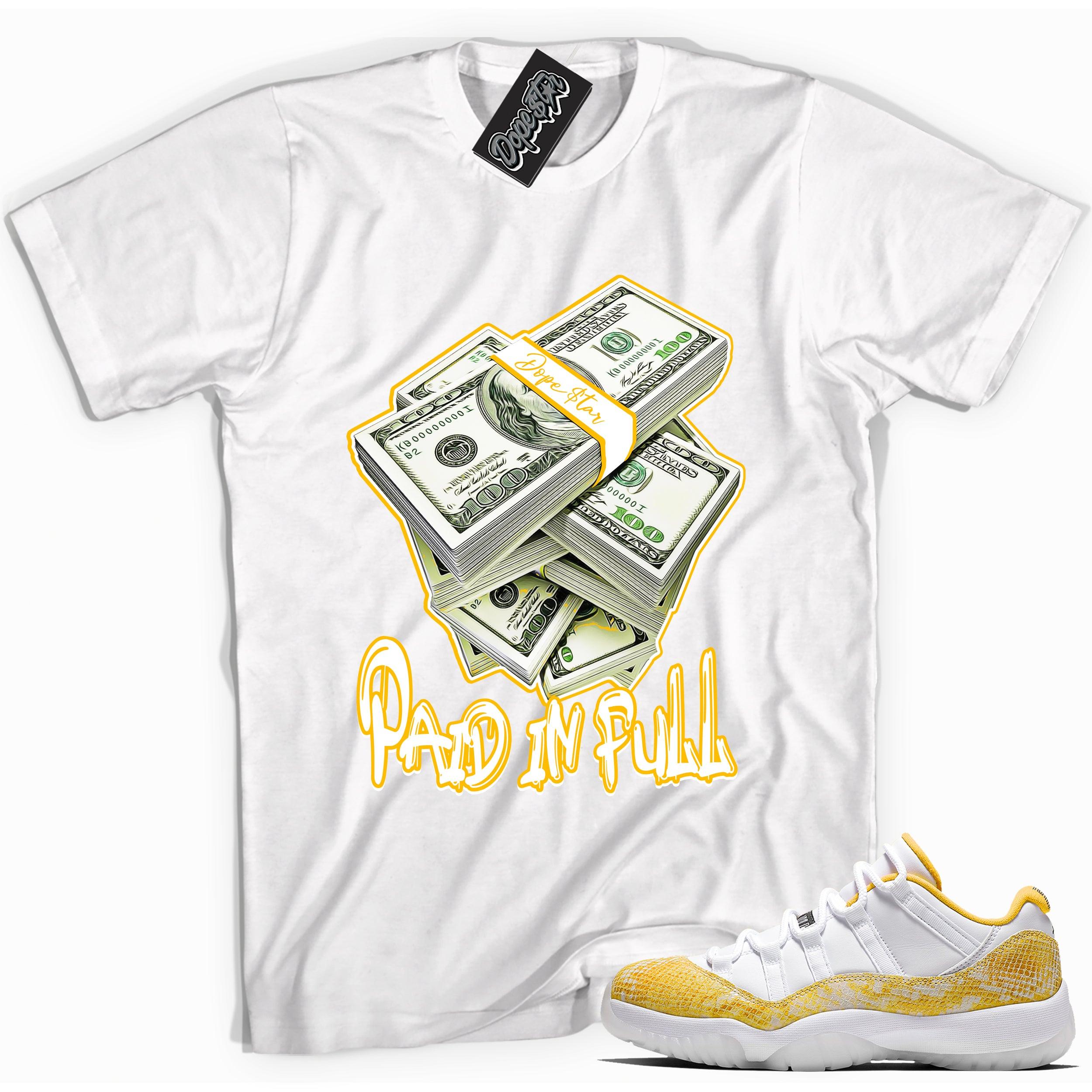 Cool white graphic tee with 'paid in full' print, that perfectly matches Air Jordan 11 Retro Low Yellow Snakeskin sneakers