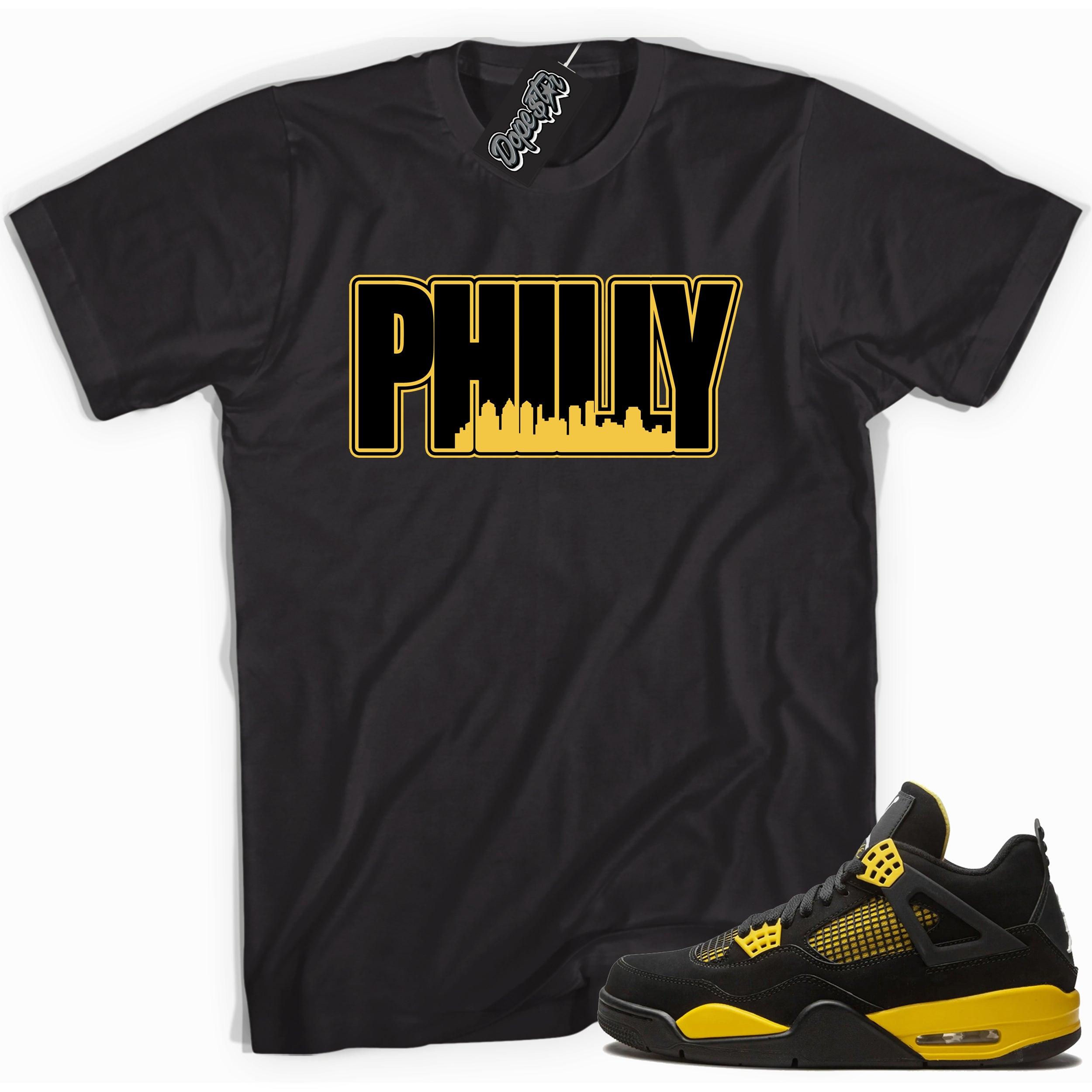 Cool black graphic tee with 'philly' print, that perfectly matches  Air Jordan 4 Thunder sneakers