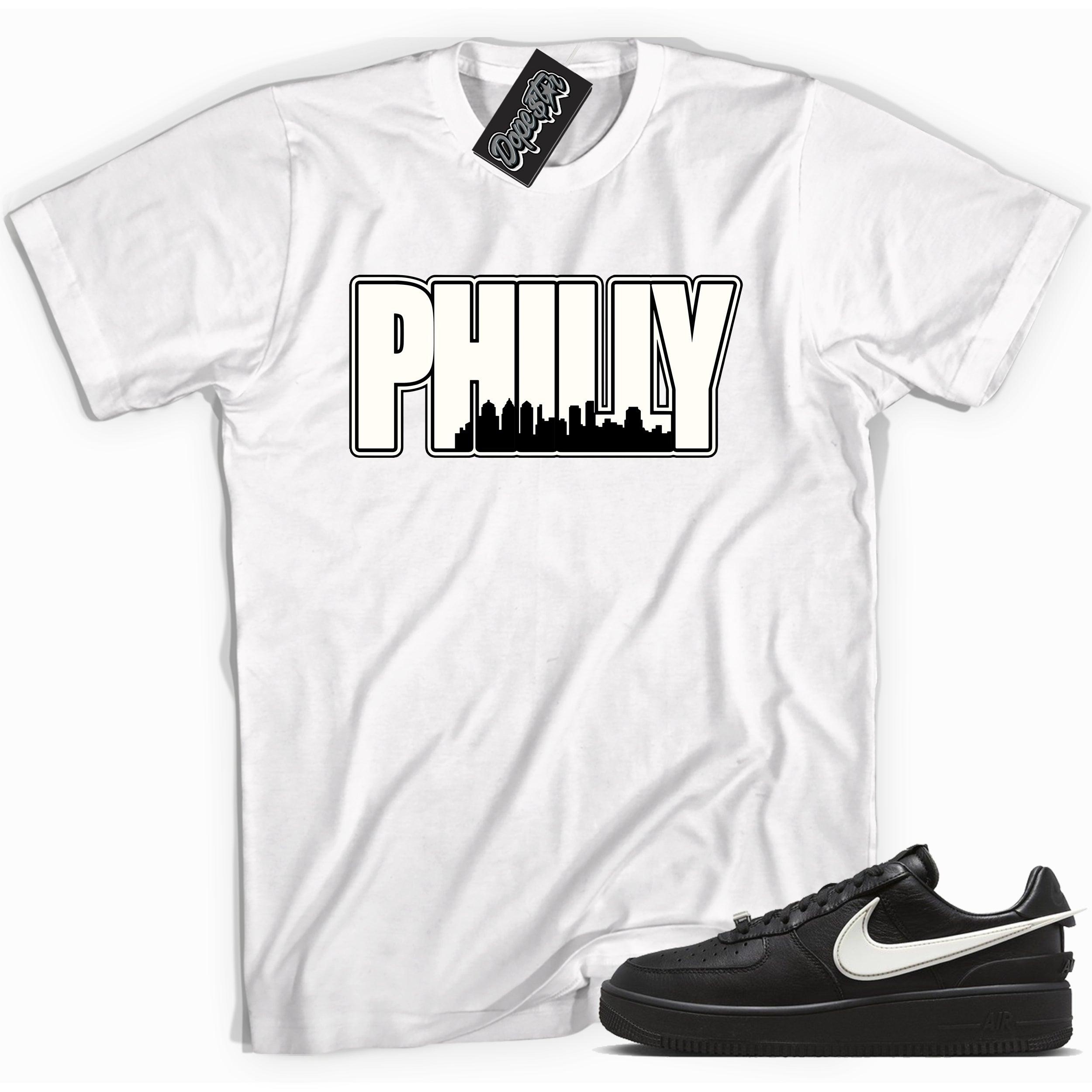 Cool white graphic tee with 'philly Philadelphia ' print, that perfectly matches Nike Air Force 1 Low SP Ambush Phantom sneakers.