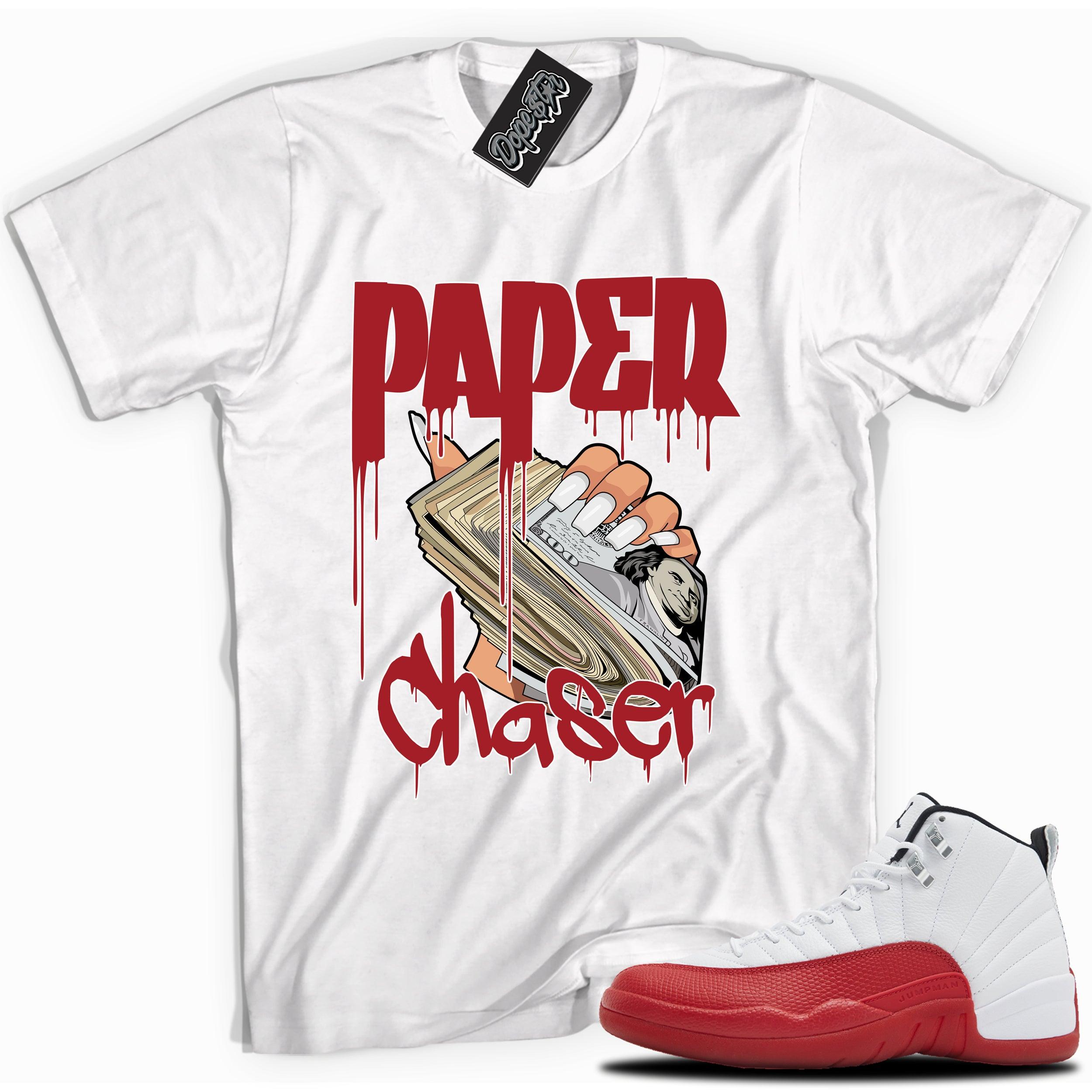 Cool White graphic tee with “Paper Chaser” print, that perfectly matches Air Jordan 12 Retro Cherry Red 2023 red and white sneakers