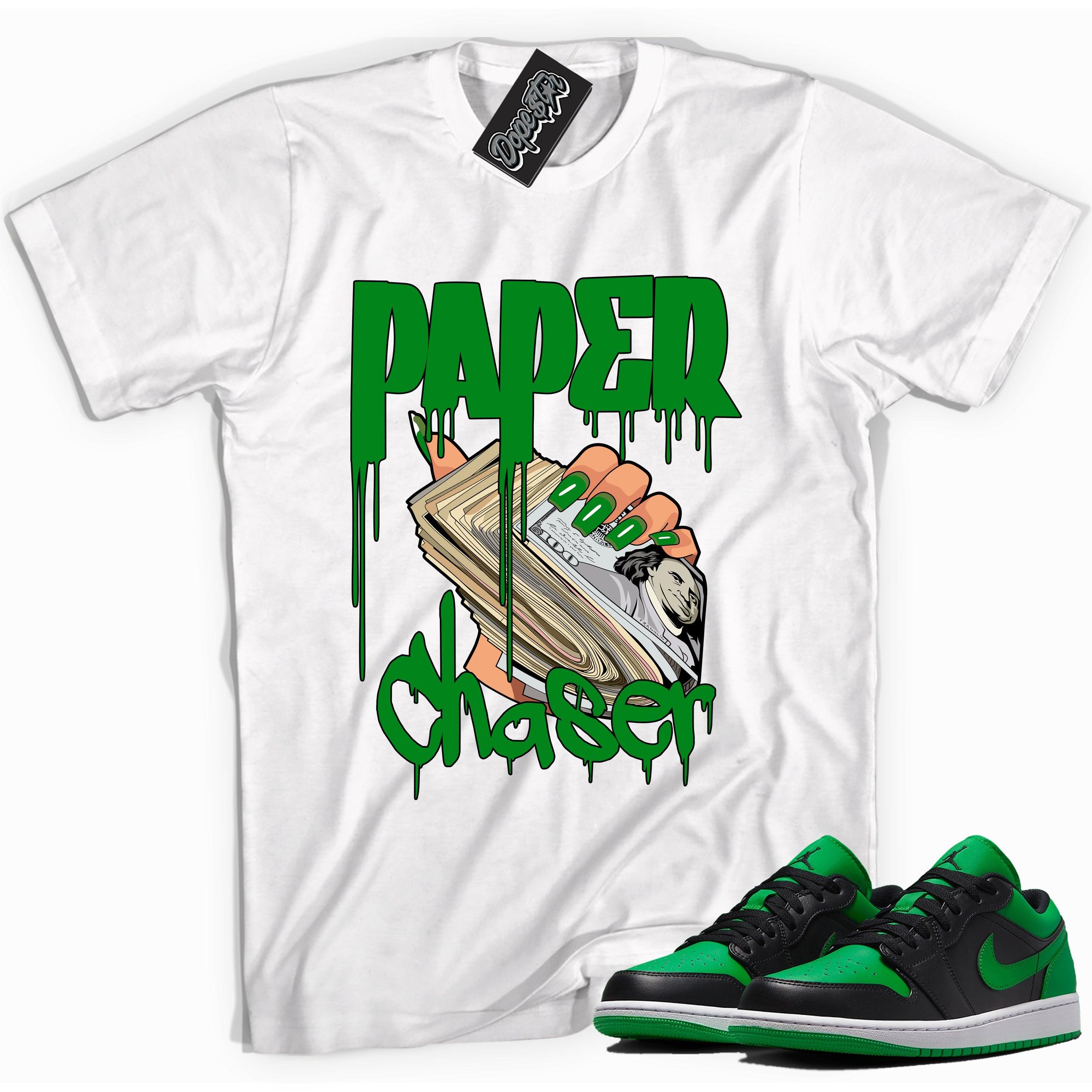 Cool white graphic tee with 'paper chaser' print, that perfectly matches Air Jordan 1 Low Lucky Green sneakers