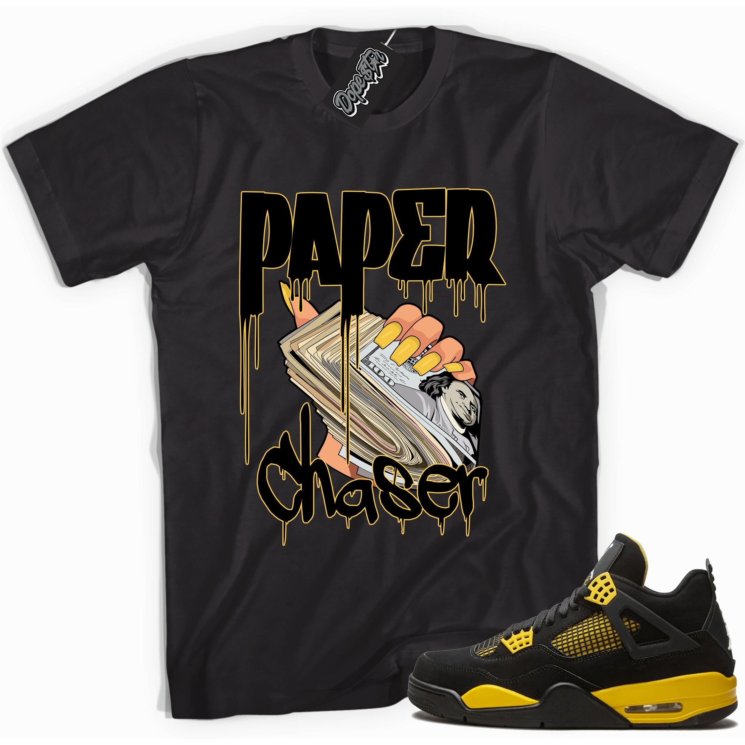 Cool black graphic tee with 'paper chaser' print, that perfectly matches  Air Jordan 4 Thunder sneakers