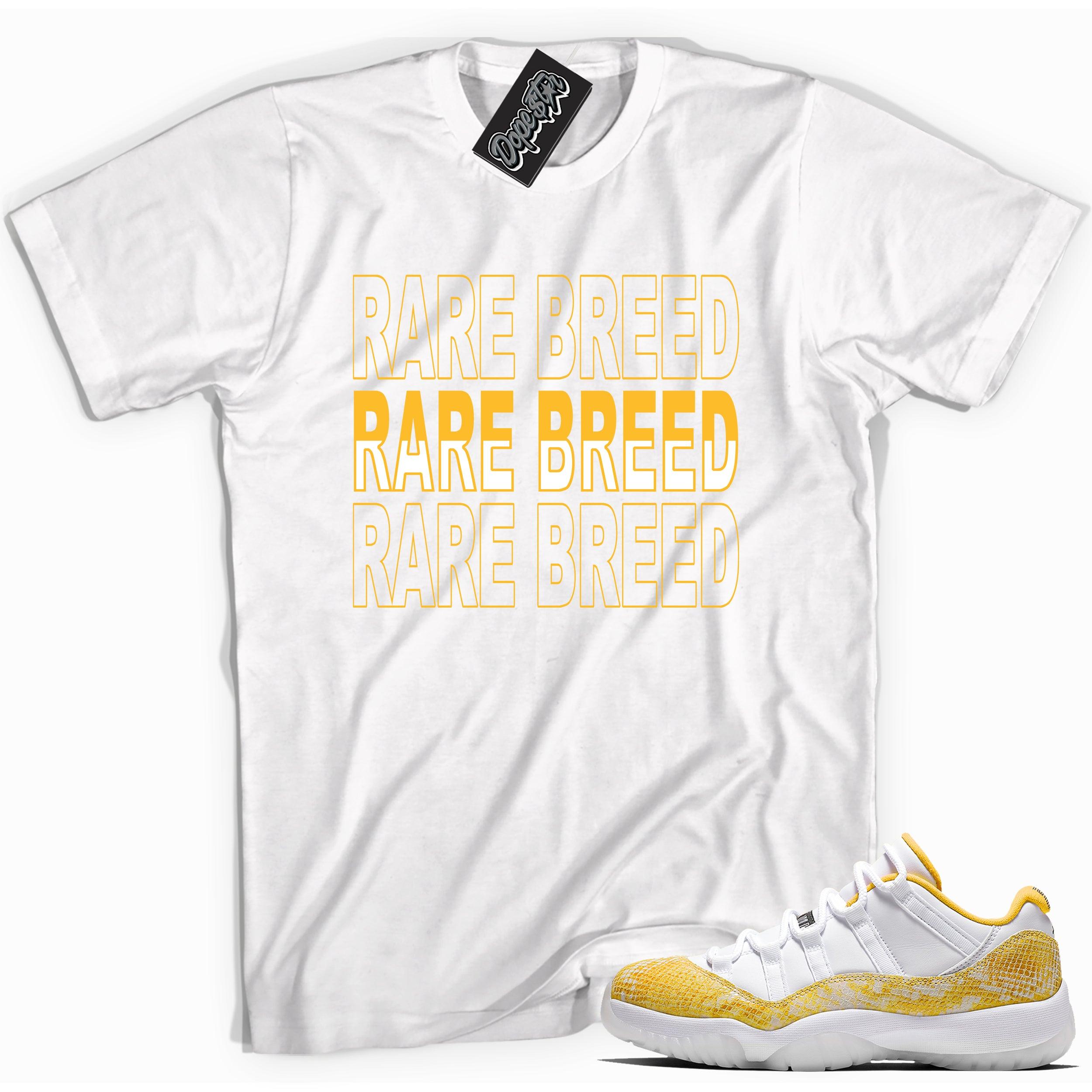 Cool white graphic tee with 'rare breed' print, that perfectly matches Air Jordan 11 Retro Low Yellow Snakeskin sneakers