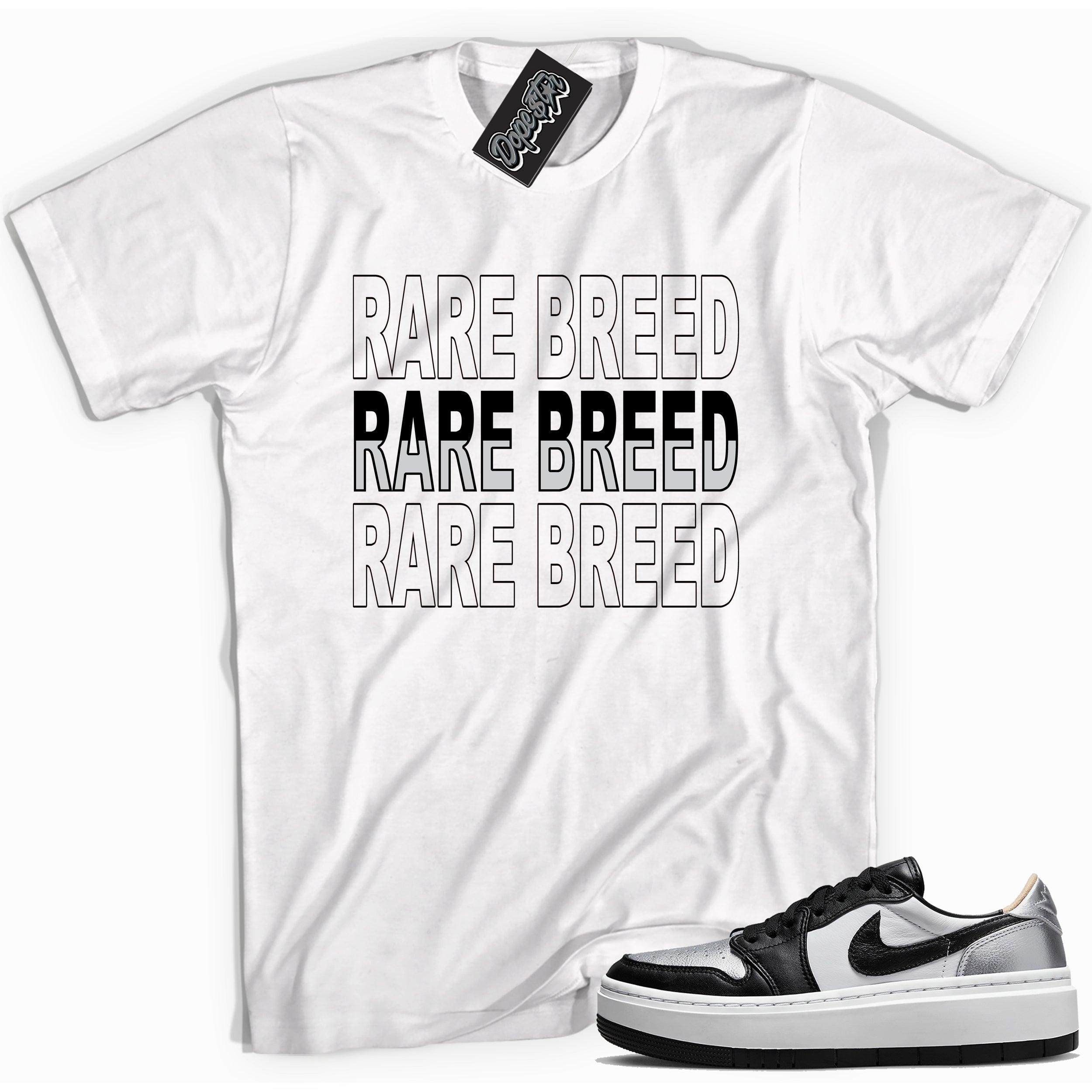 Cool white graphic tee with 'rare breed' print, that perfectly matches Air Jordan 1 Elevate Low SE Silver Toe sneakers.