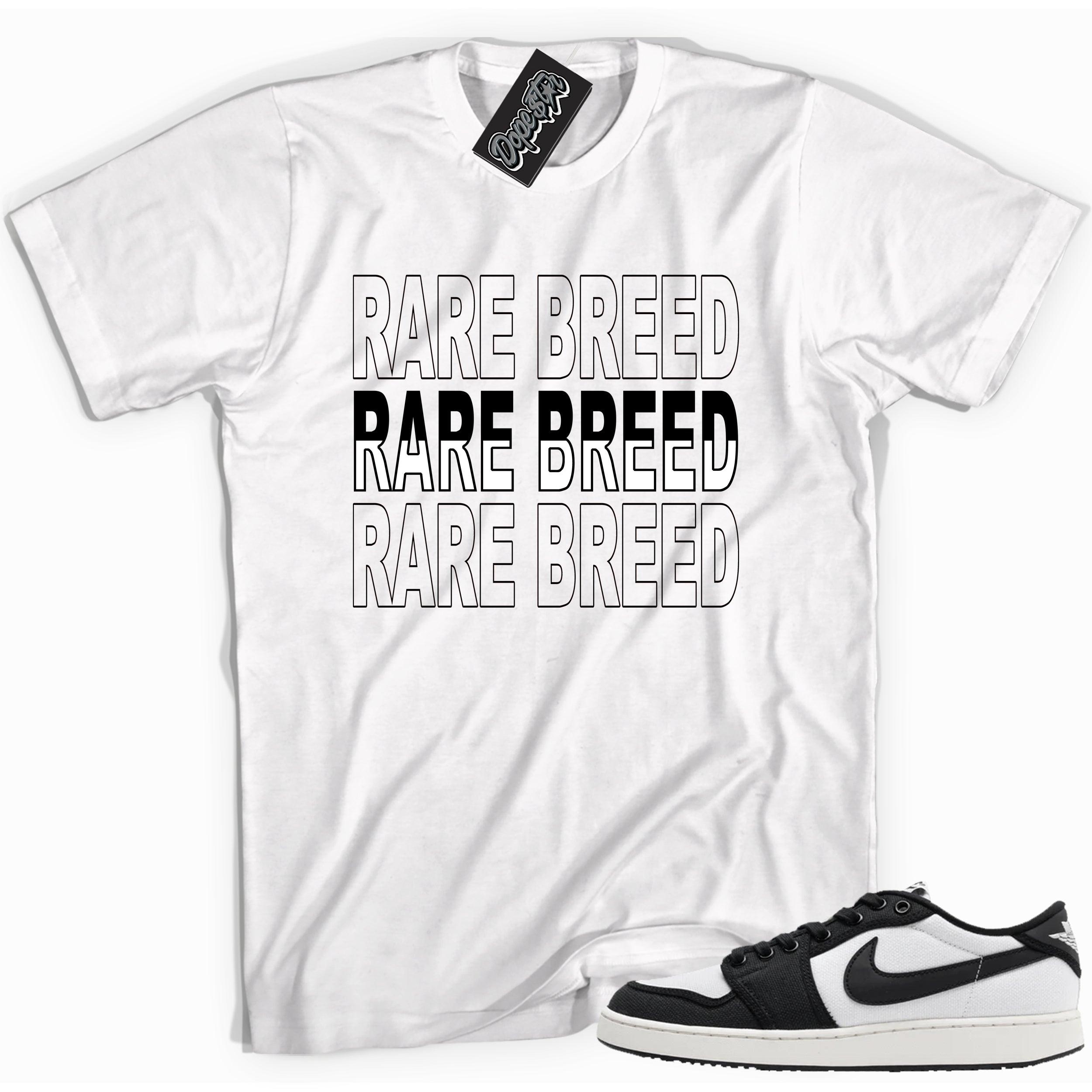 Cool white graphic tee with 'rare breed' print, that perfectly matches Air Jordan 1 Retro Ajko Low Black & White sneakers.