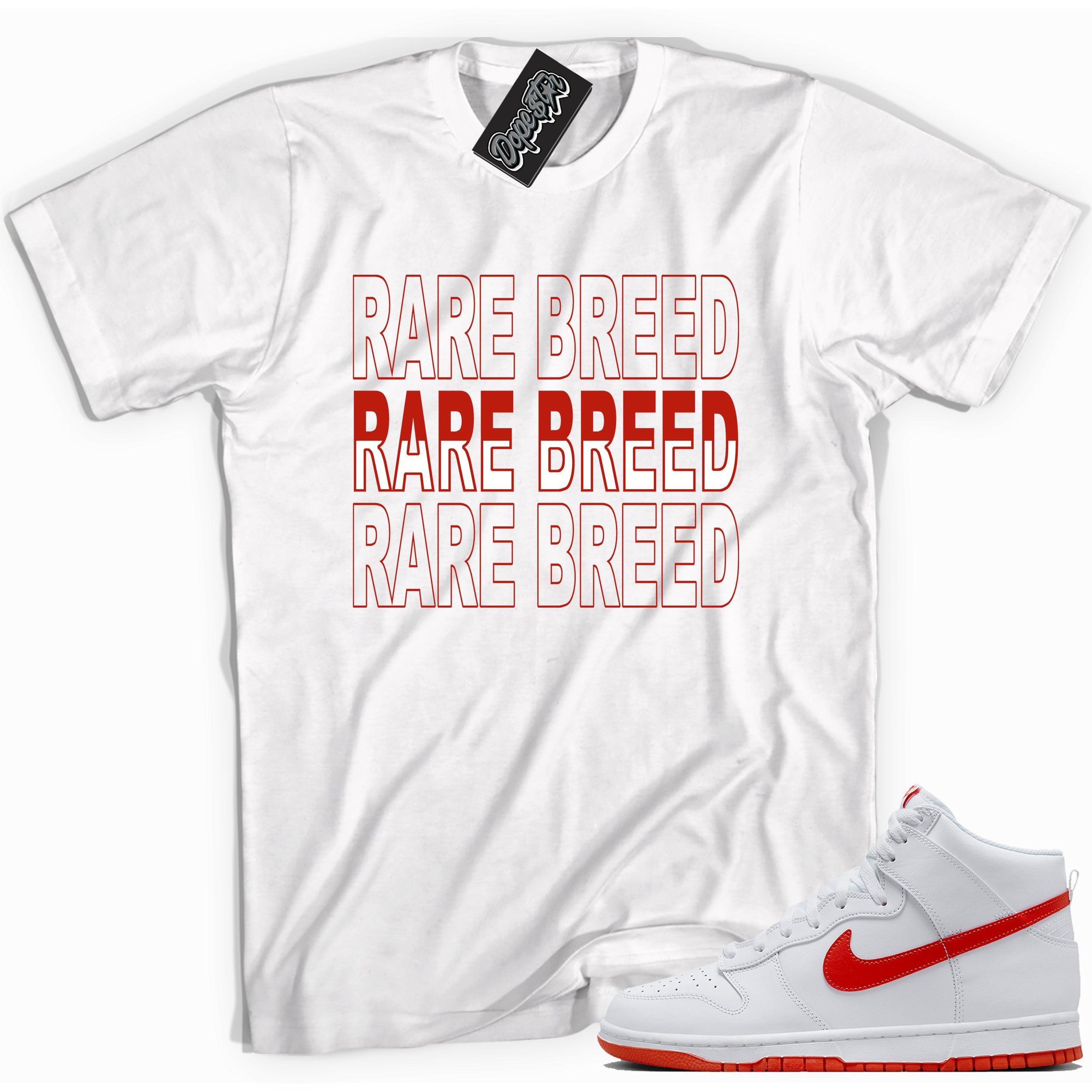 Cool white graphic tee with 'rare breed' print, that perfectly matches Nike Dunk High White Picante Red sneakers.