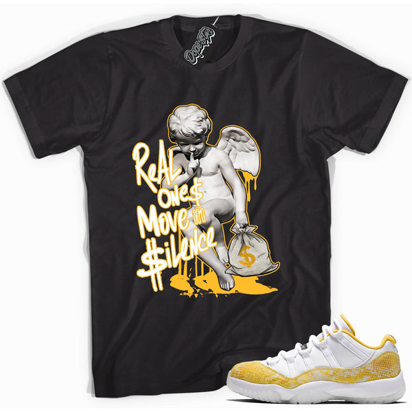 Cool black graphic tee with 'real ones move in silence' print, that perfectly matches  Air Jordan 11 Retro Low Yellow Snakeskin sneakers