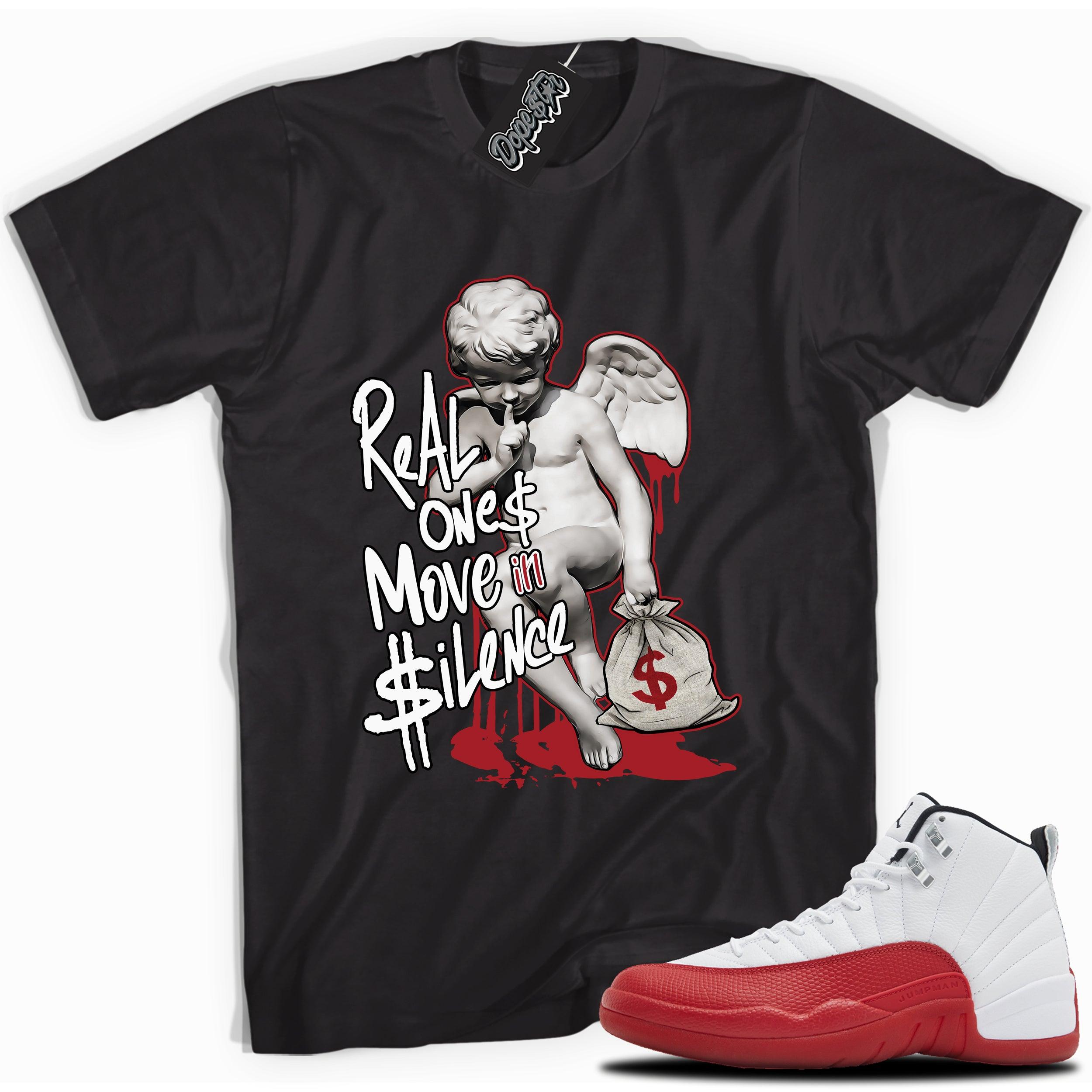 Cool Black graphic tee with “REAL ONES CHERUB” print, that perfectly matches Air Jordan 12 Retro Cherry Red 2023 red and white sneakers